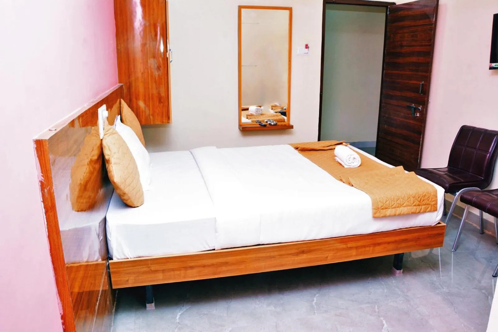 Bedroom in Udupi Deluxe Lodge Gulbarga