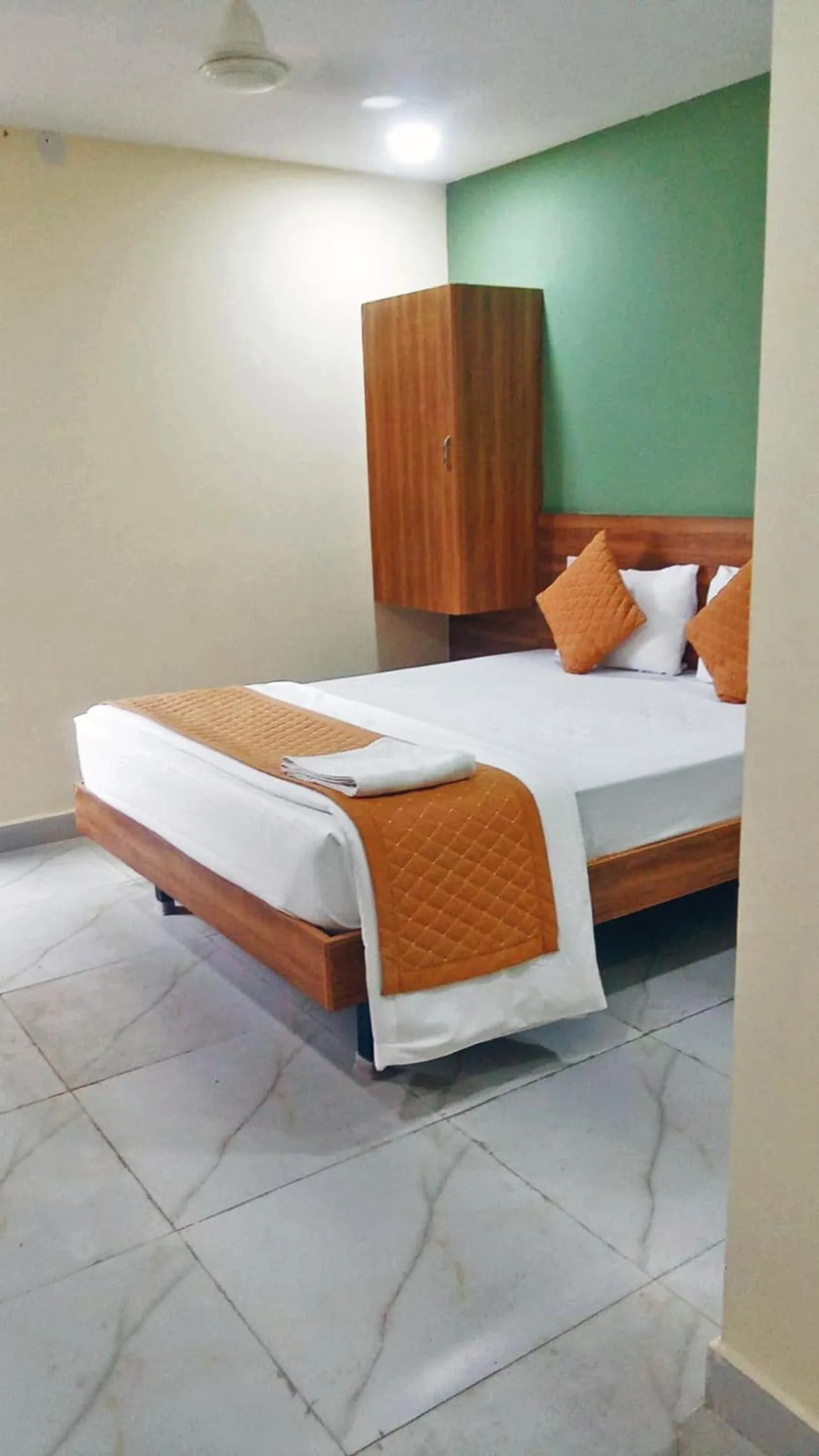 Bedroom in Udupi Deluxe Lodge Gulbarga