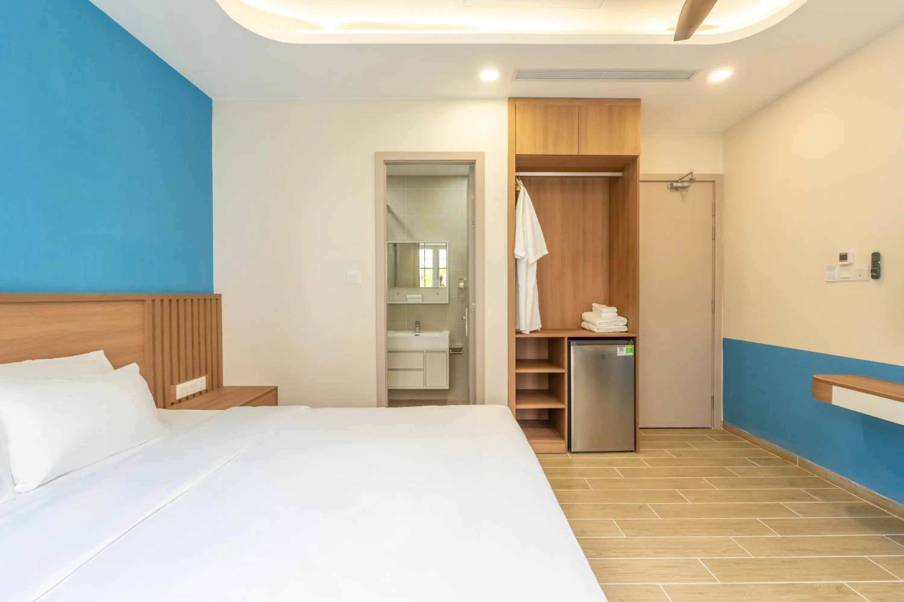 Bed in HL Melody Boutique Hotel