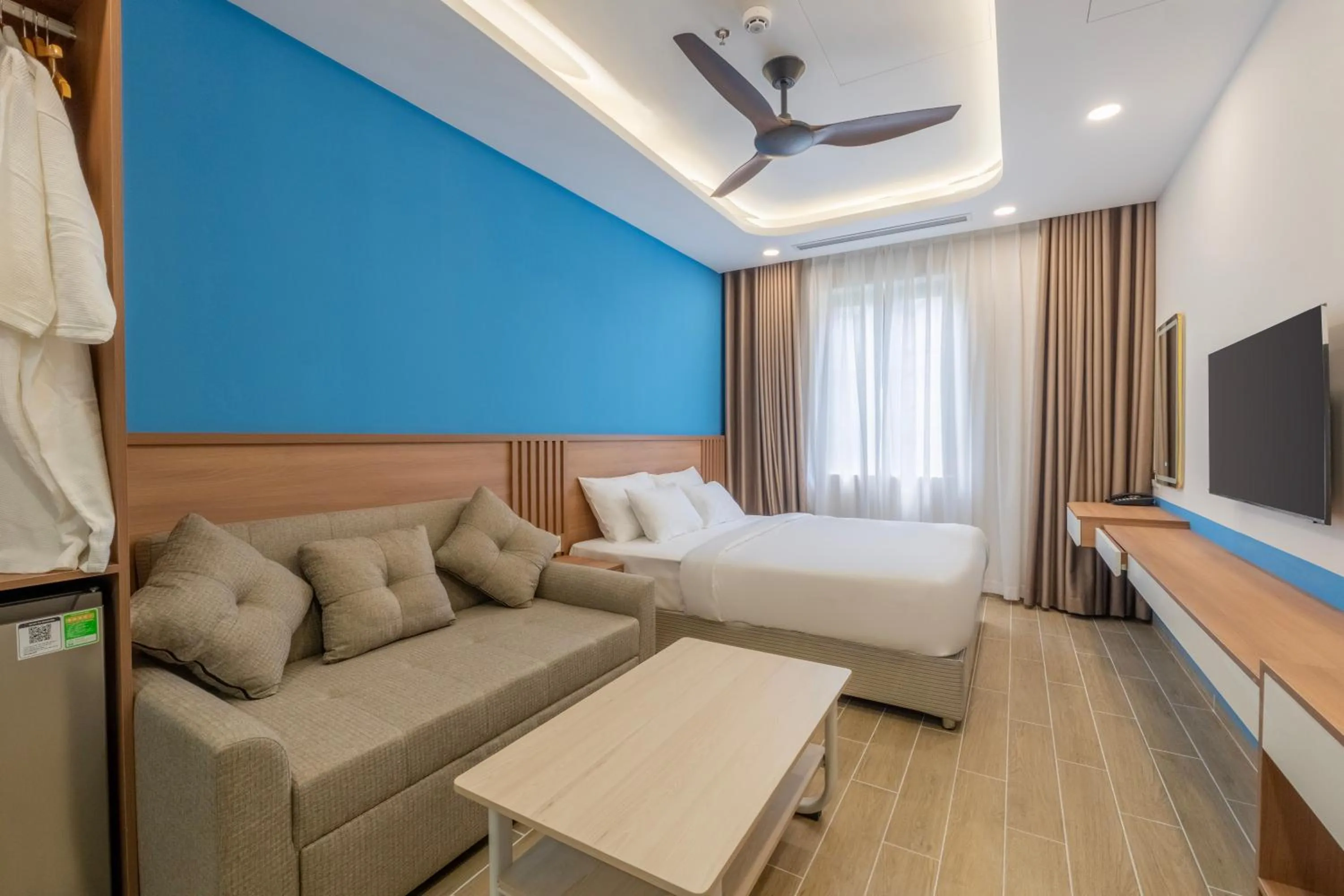 Bed in HL Melody Boutique Hotel