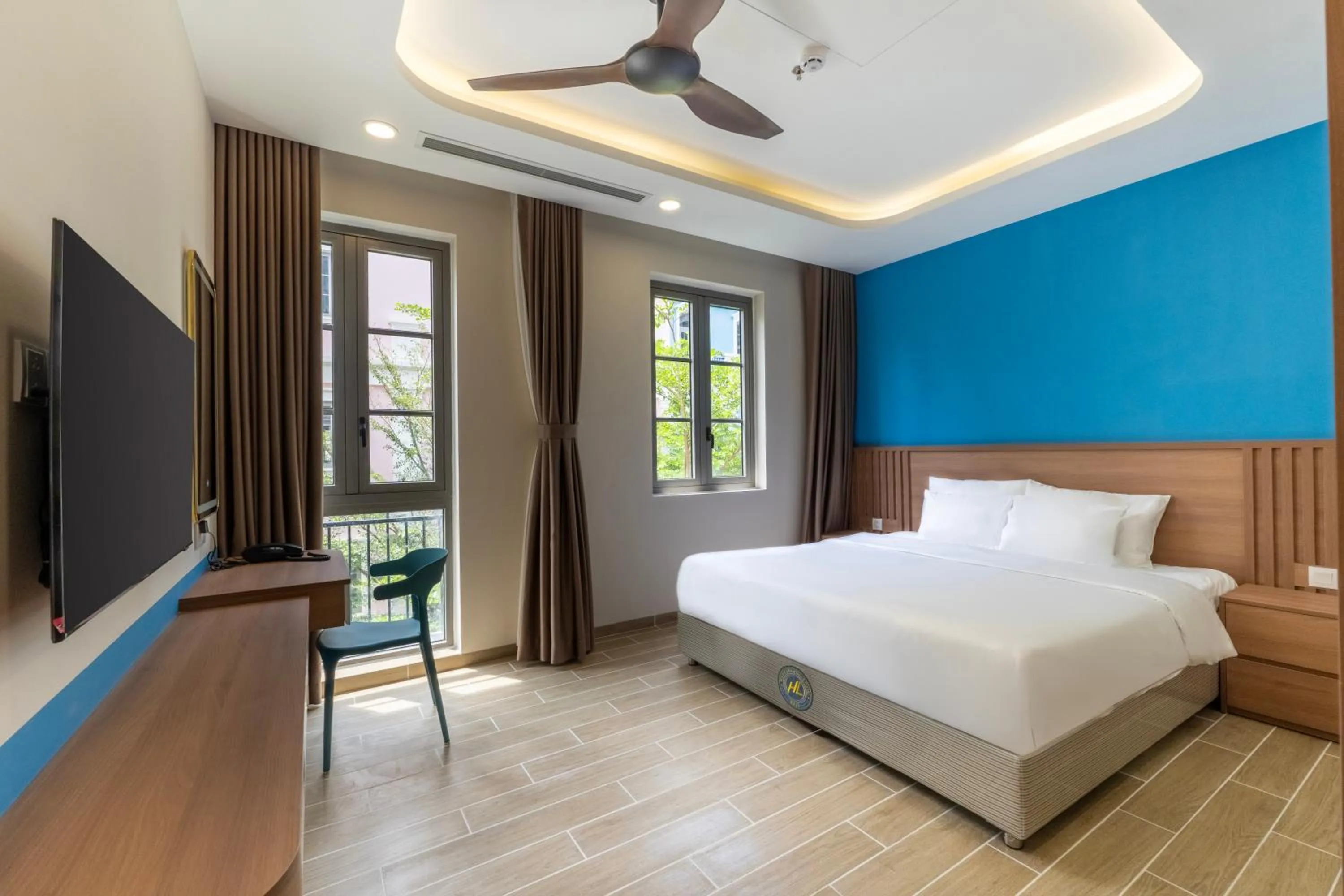 Bed in HL Melody Boutique Hotel