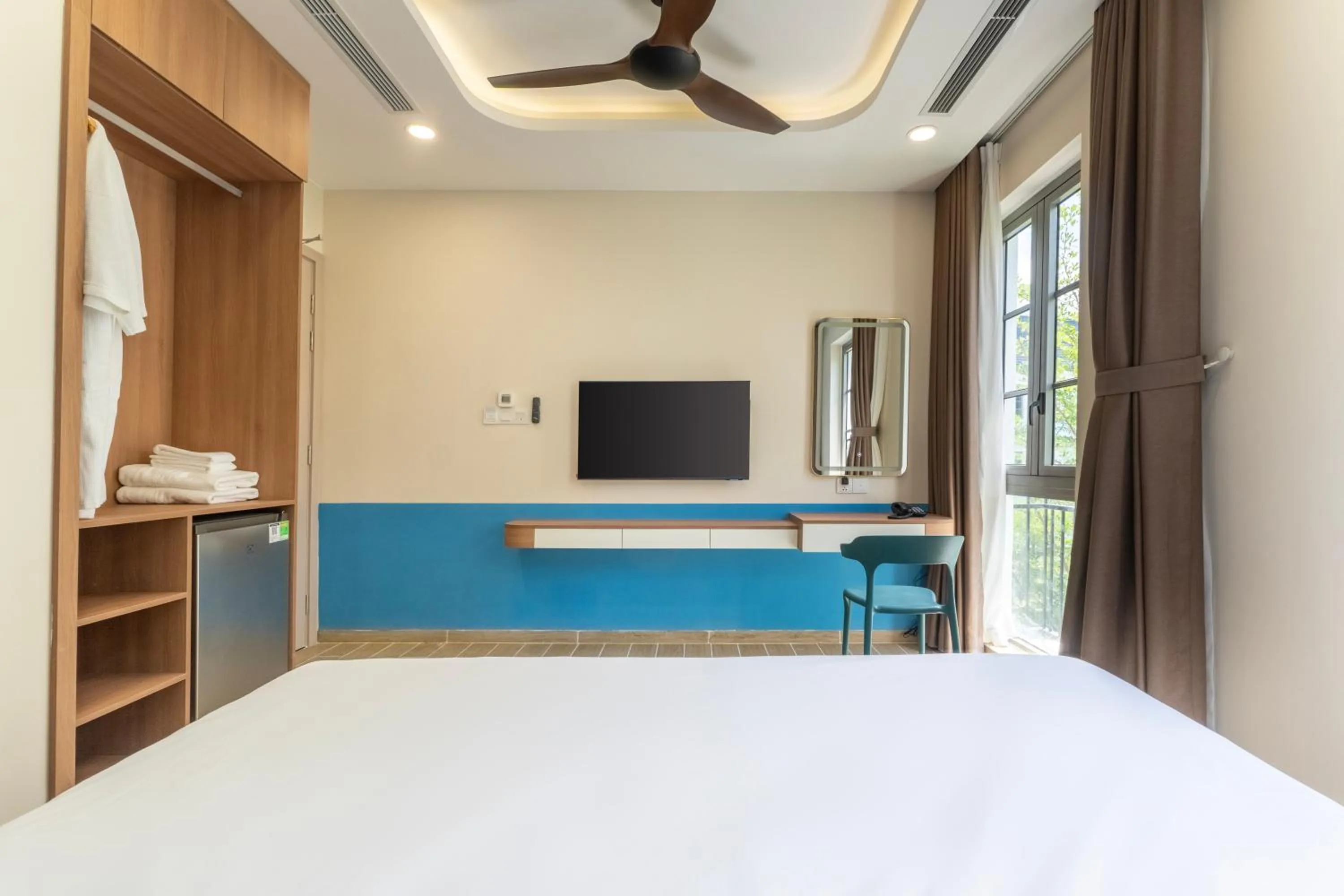 Bed in HL Melody Boutique Hotel