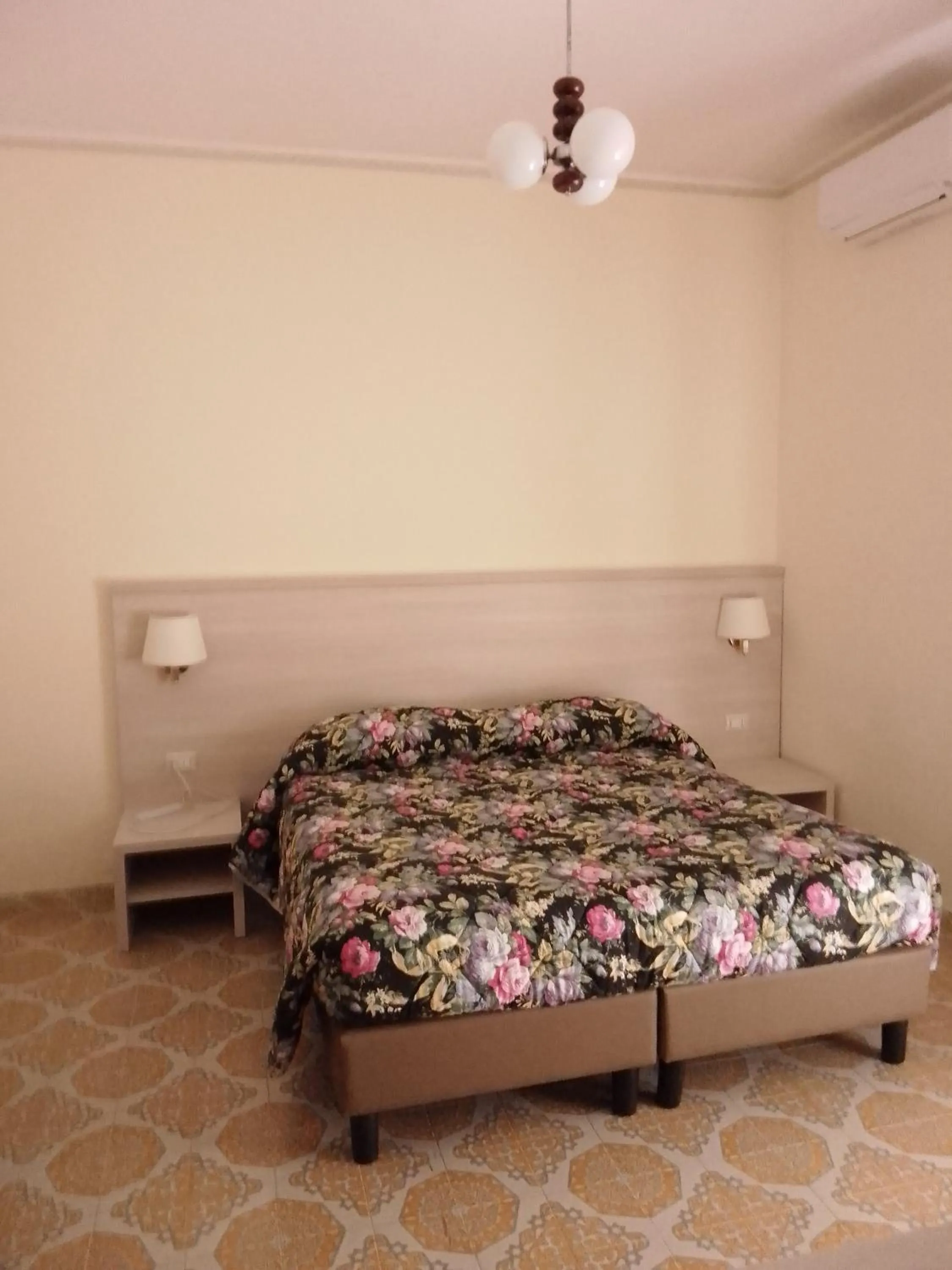 Bed in Albergo Maria Cristina