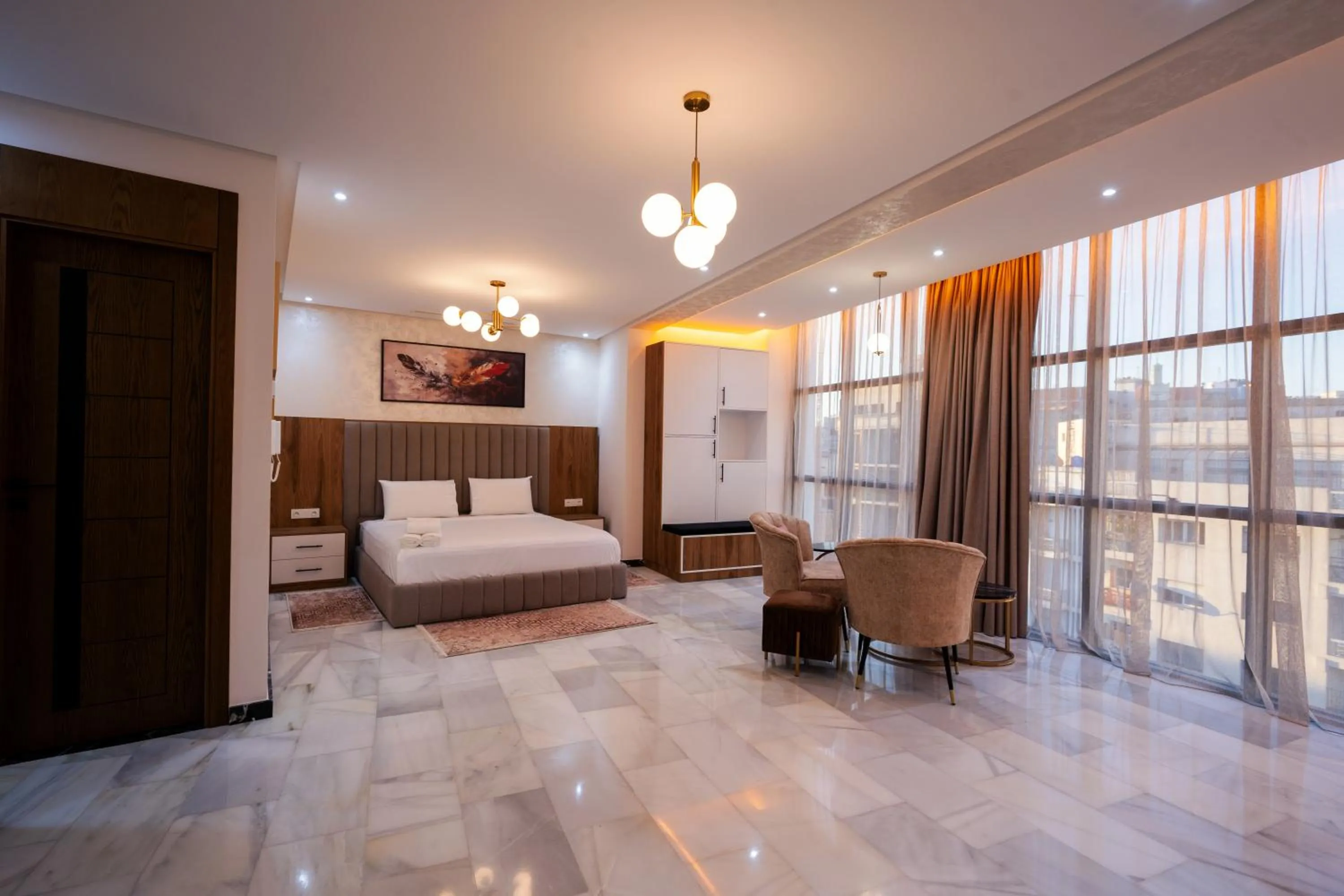 Bed in IMMOKA SUITEs