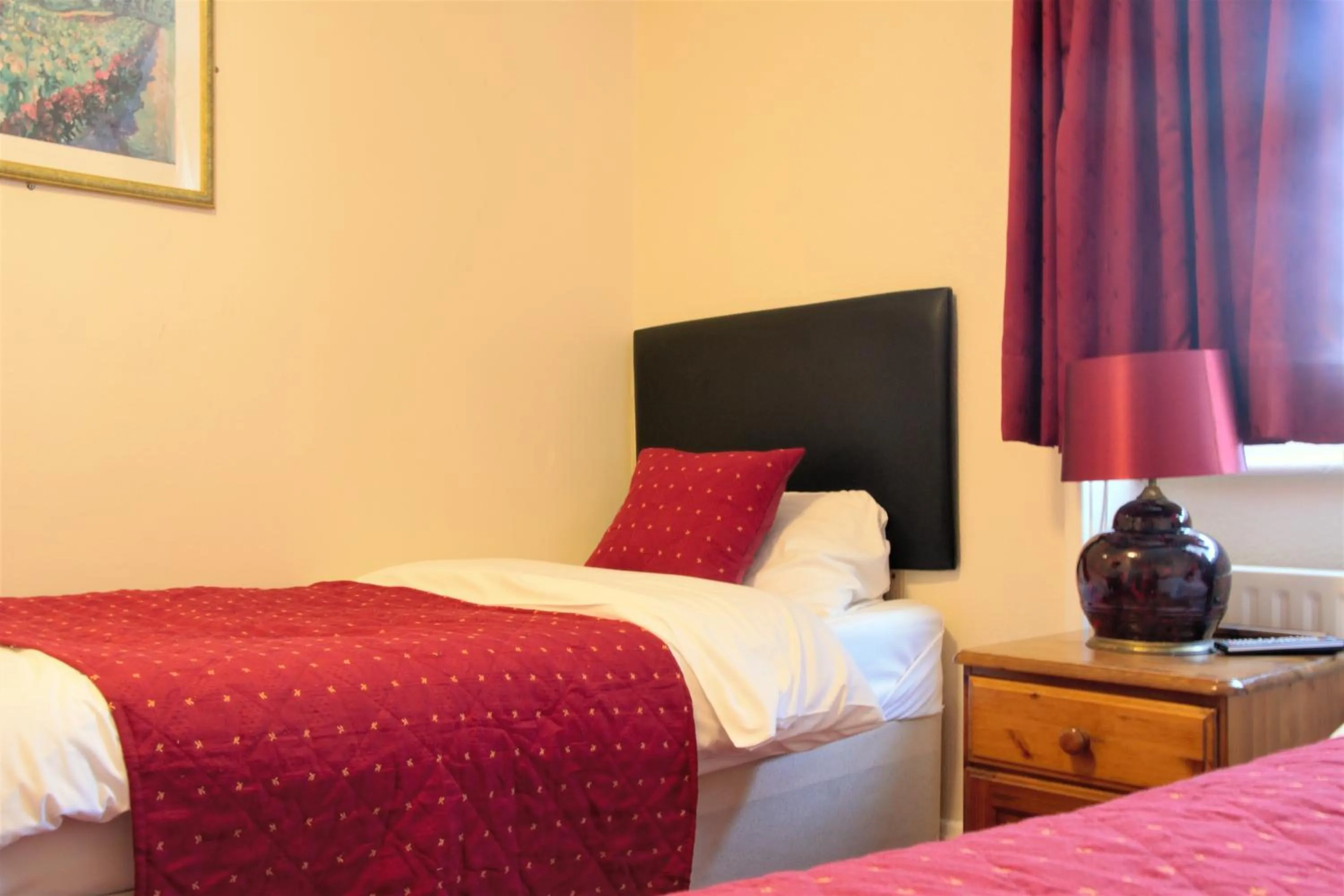 Bed in Bow Guest House