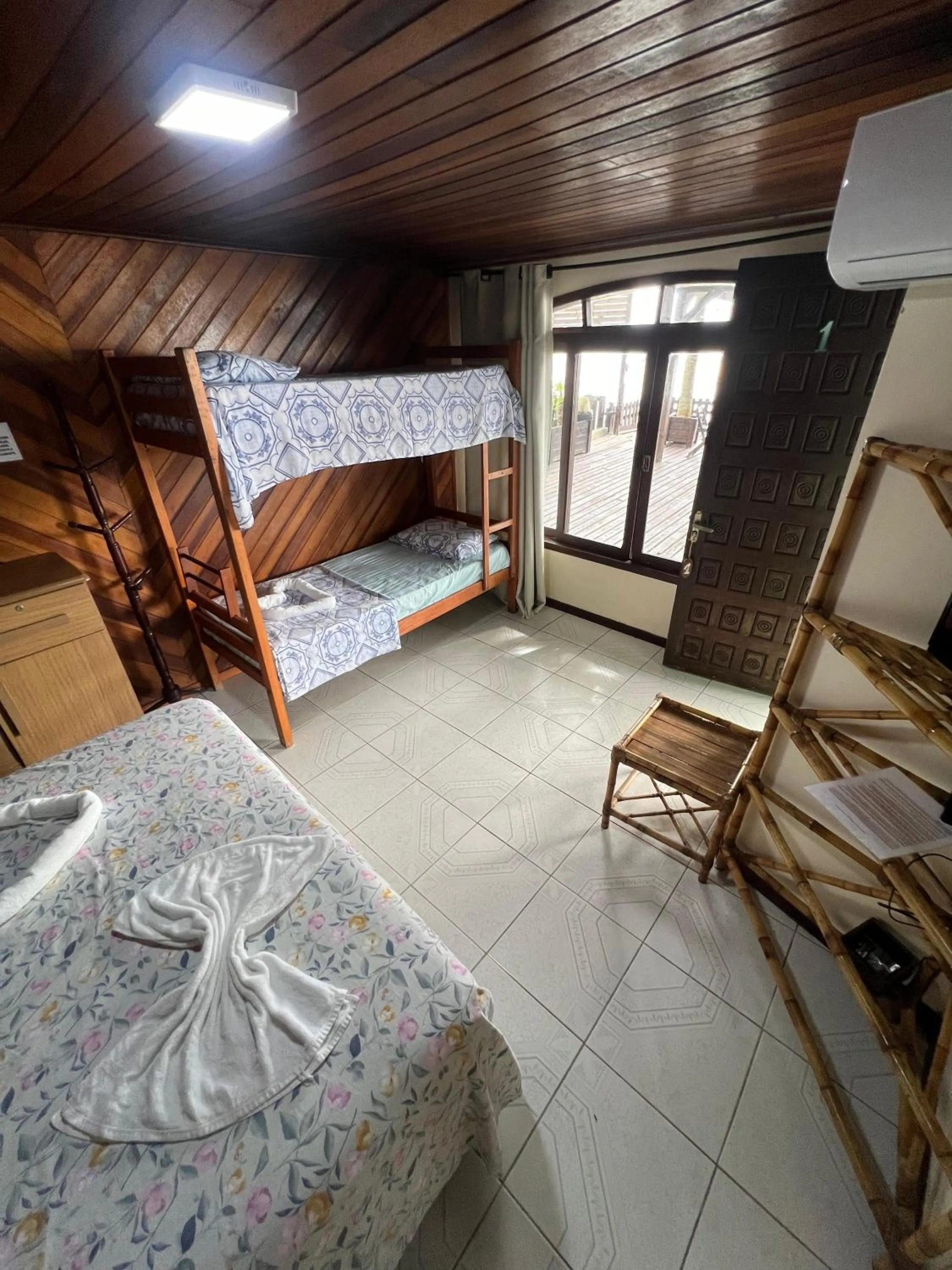 Bed in Pousada Coração da Ilha