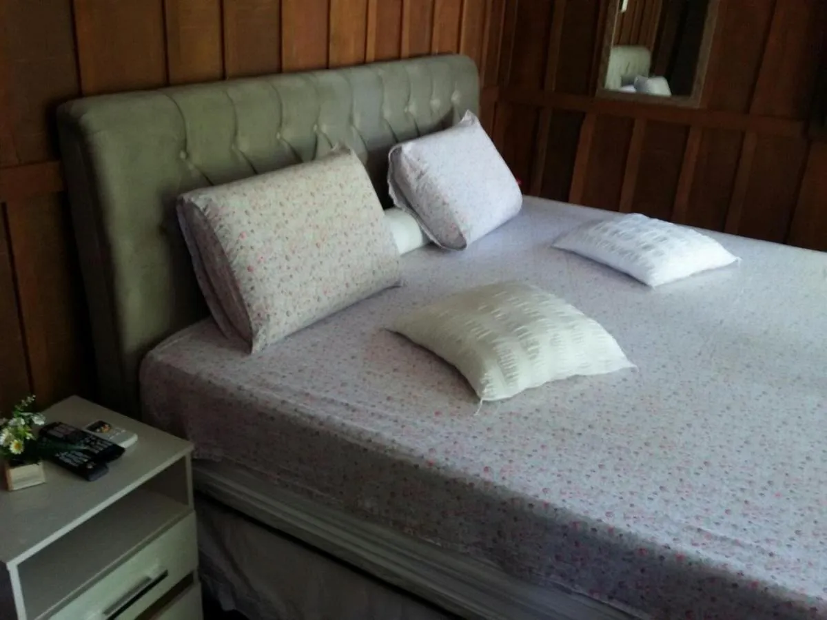 Bed in Pousada Coração da Ilha
