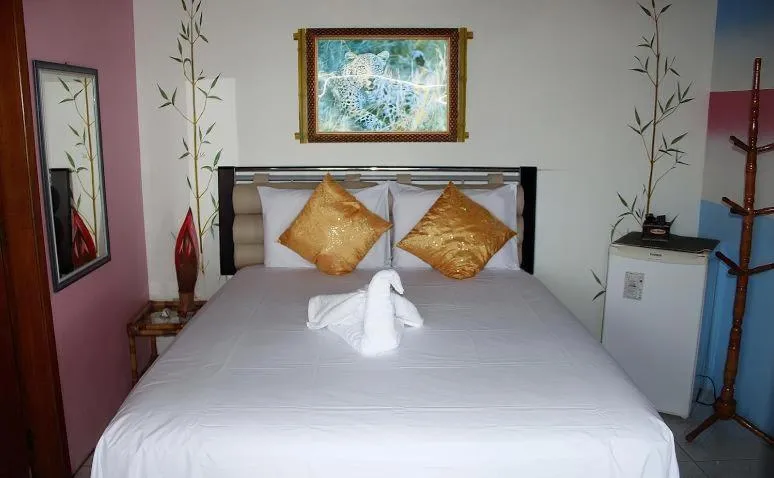 Bed in Pousada Coração da Ilha