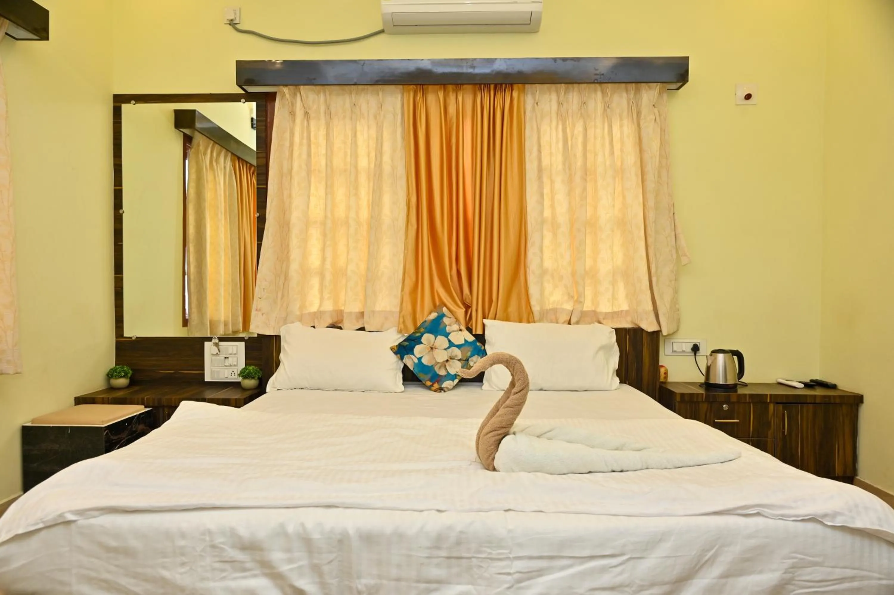 Bedroom in NAVARATHNA International resort