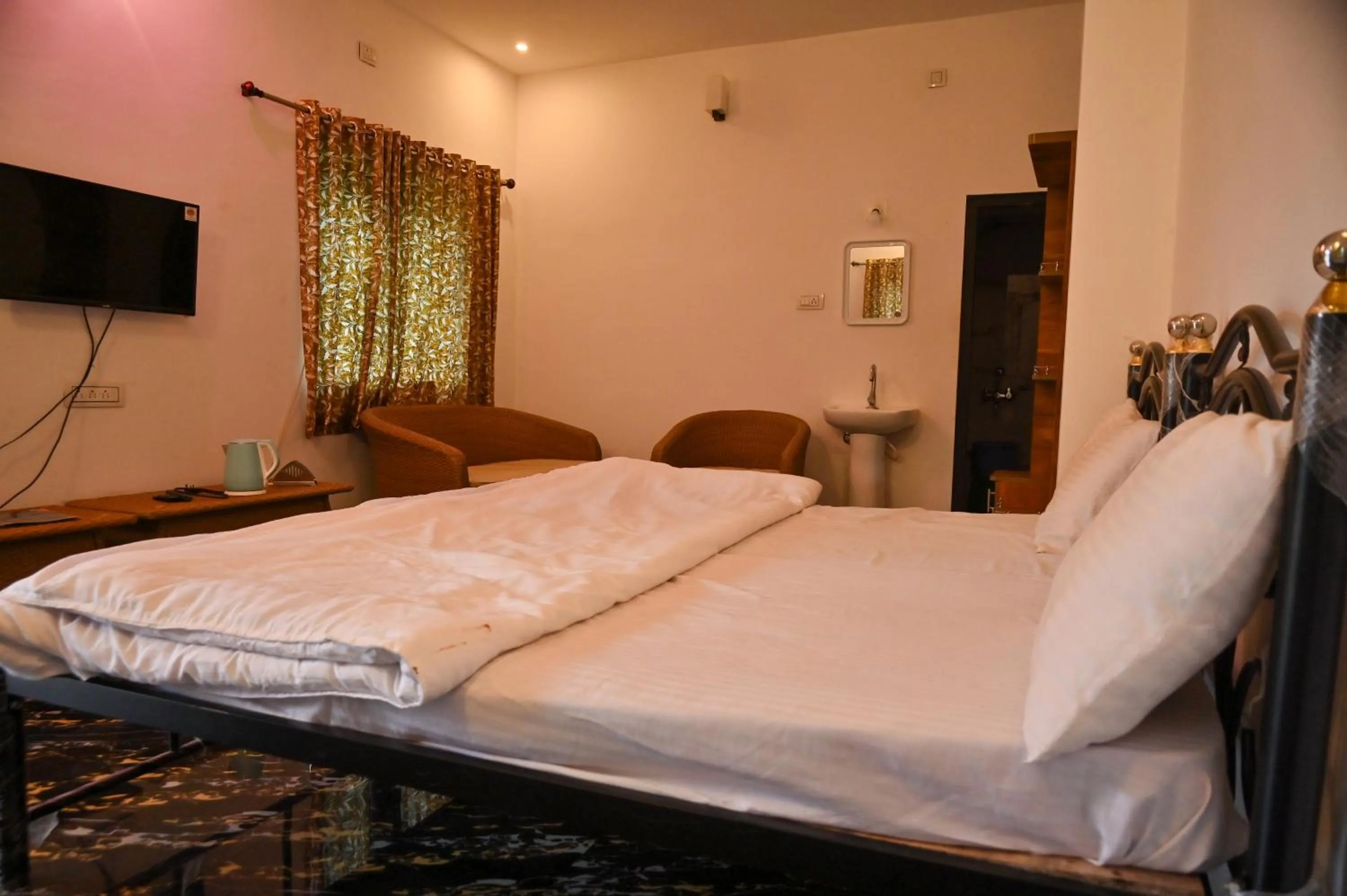 Bed in NAVARATHNA International resort