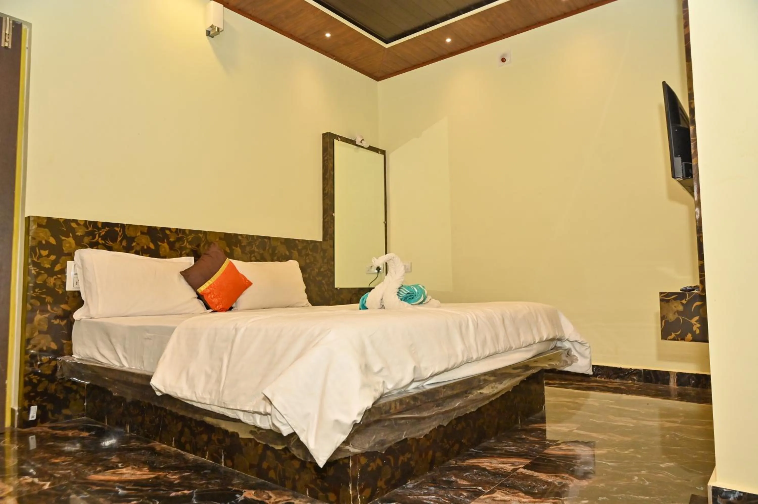 Bed in NAVARATHNA International resort