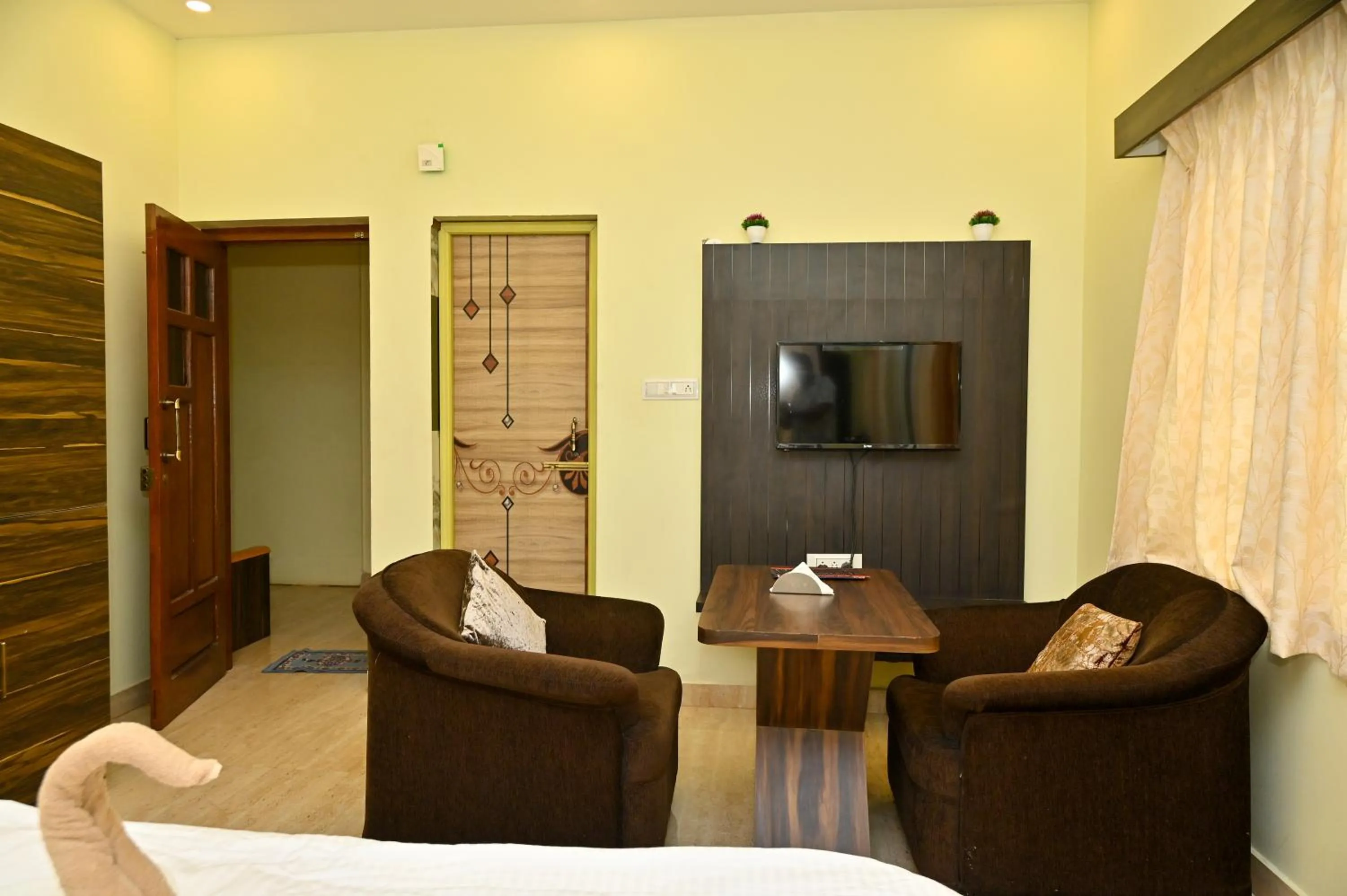 Seating area in NAVARATHNA International resort