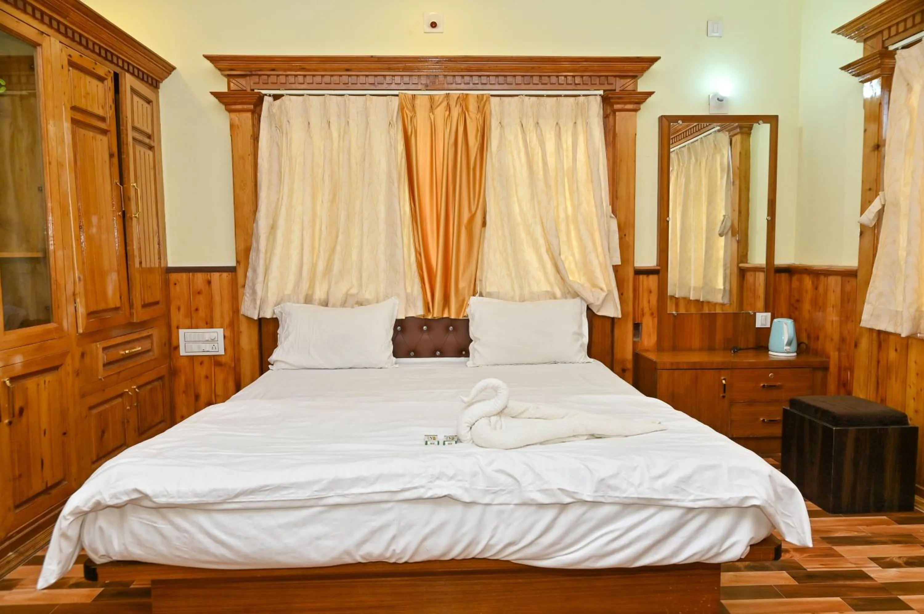 Bed in NAVARATHNA International resort