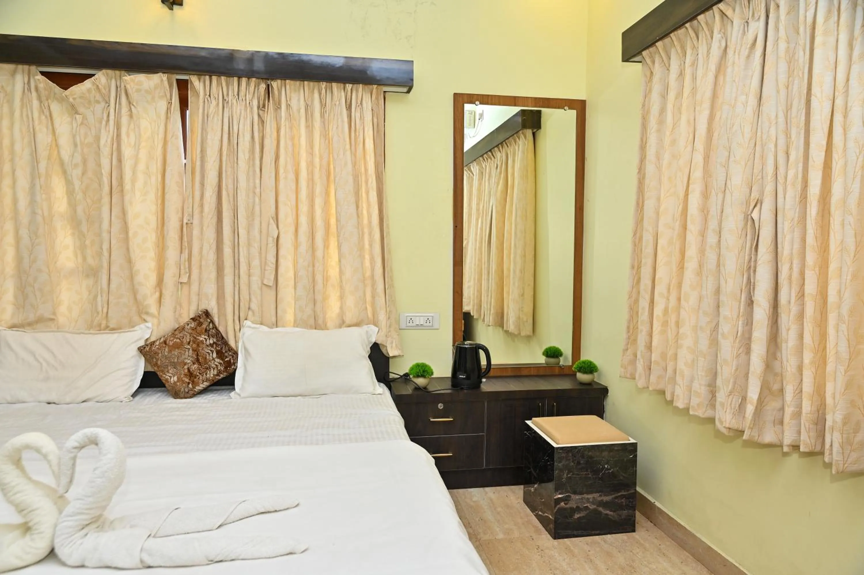 Bed in NAVARATHNA International resort