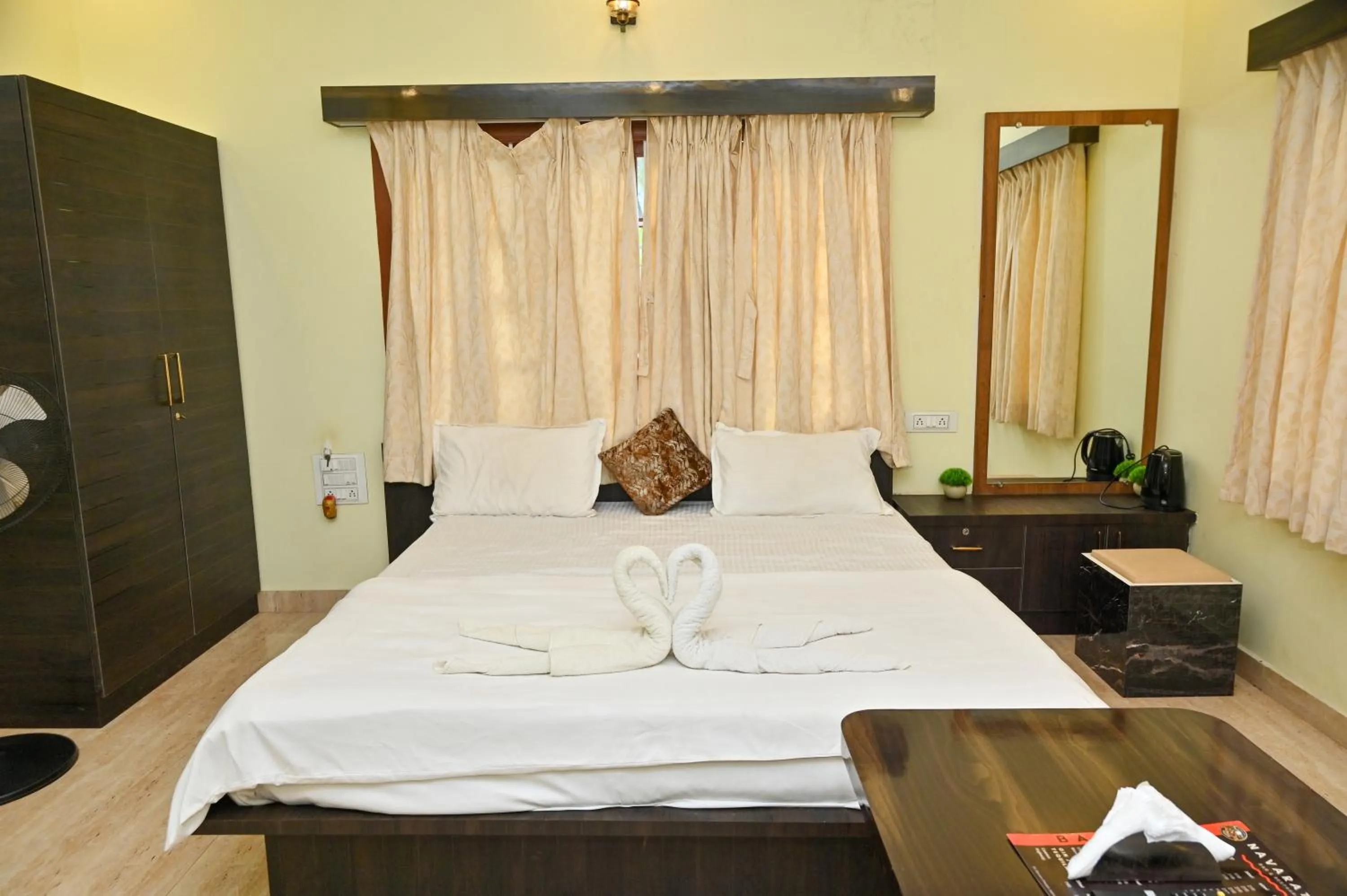Bed in NAVARATHNA International resort