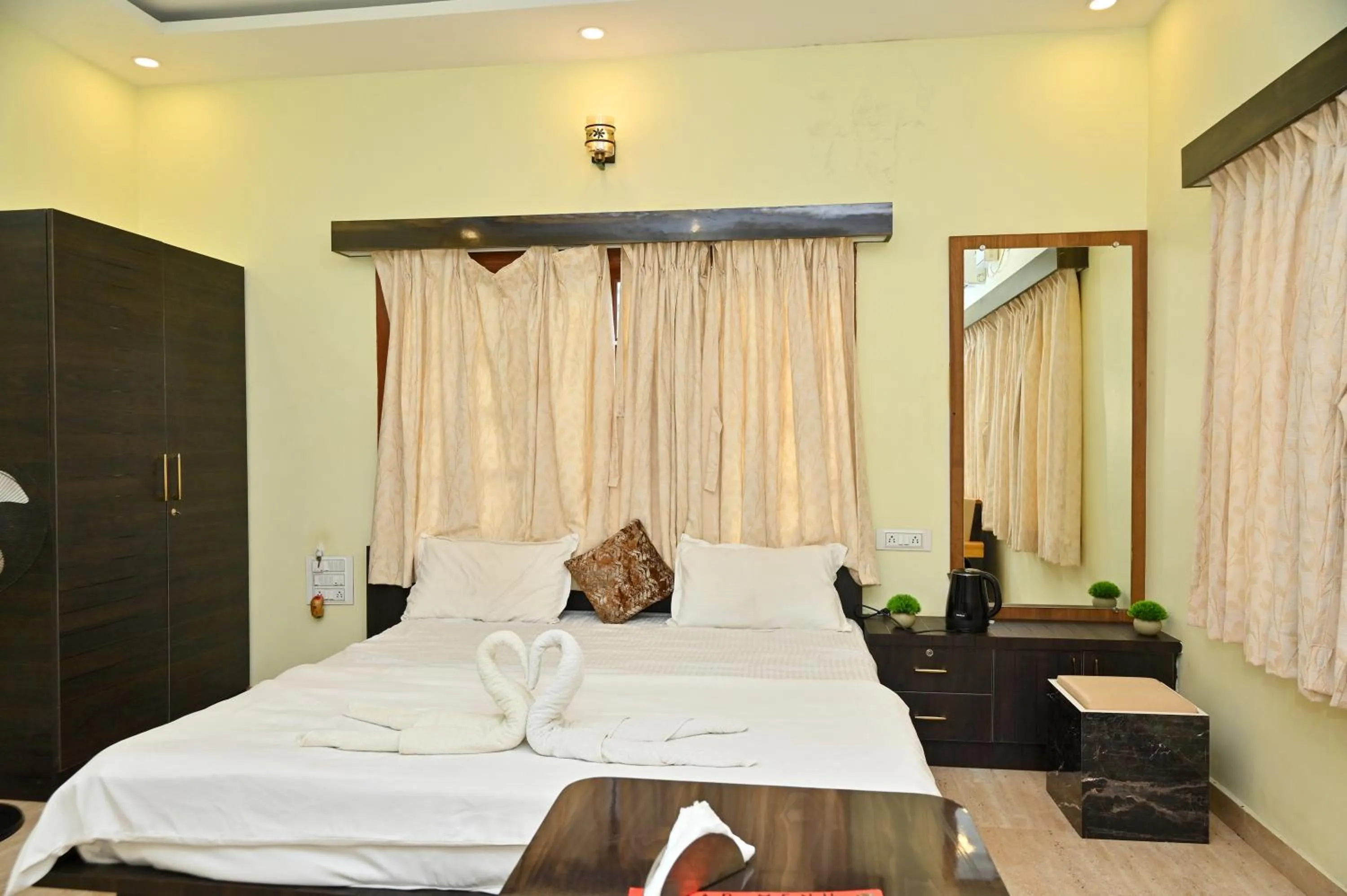 Bed in NAVARATHNA International resort