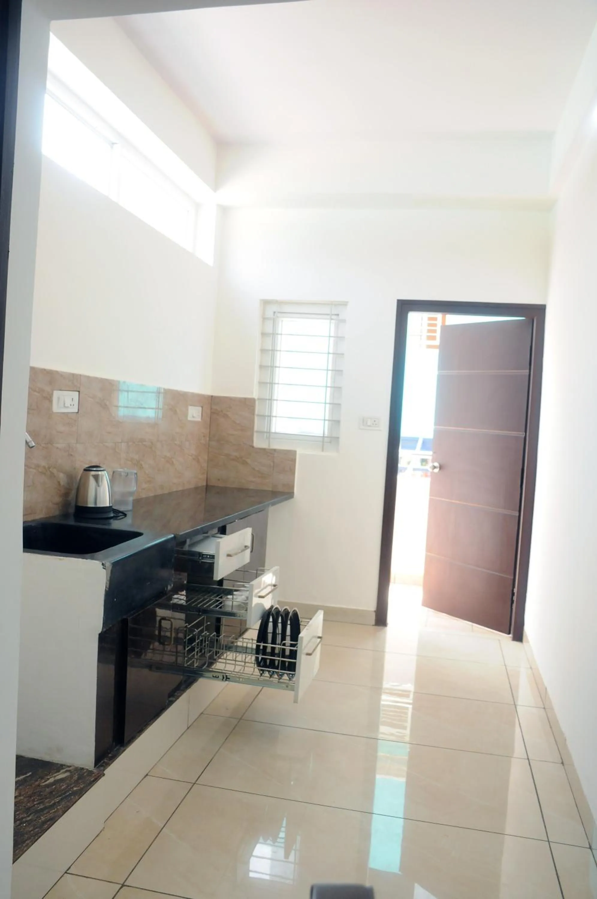 Kitchen or kitchenette in Amma Inn Elegance Suites and Apartments