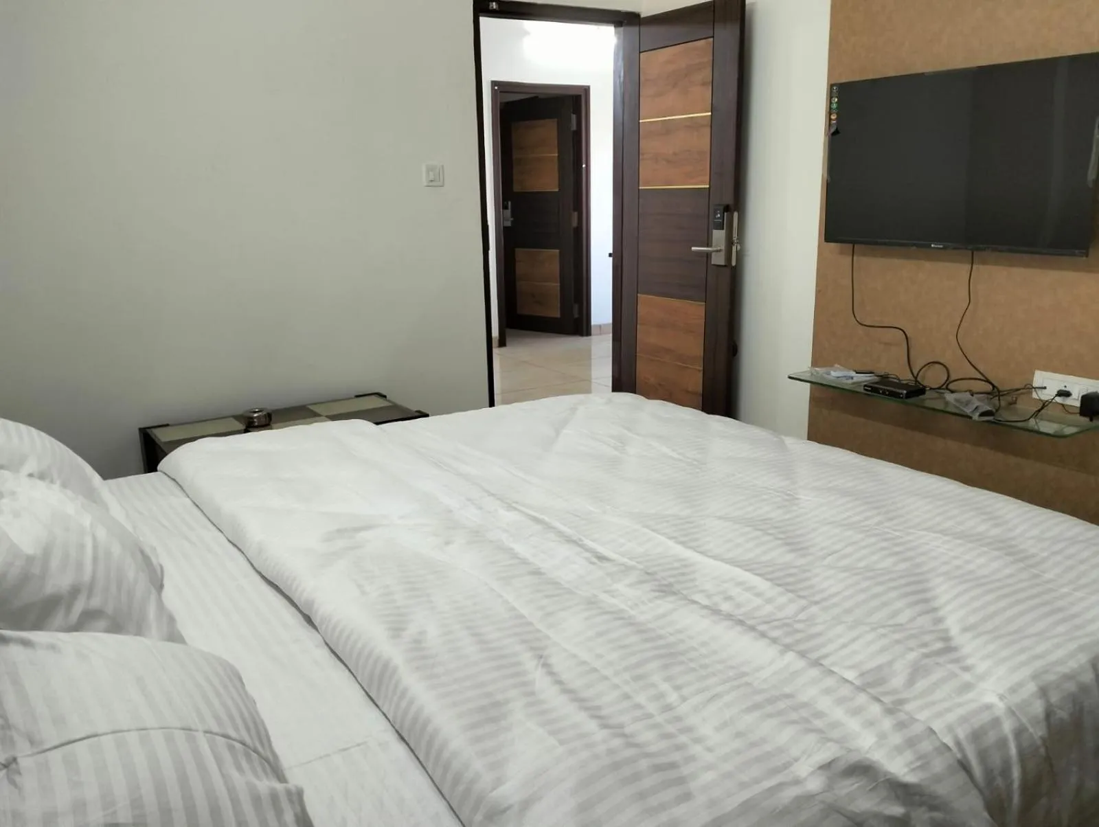 Bed in Amma Inn Elegance Suites and Apartments