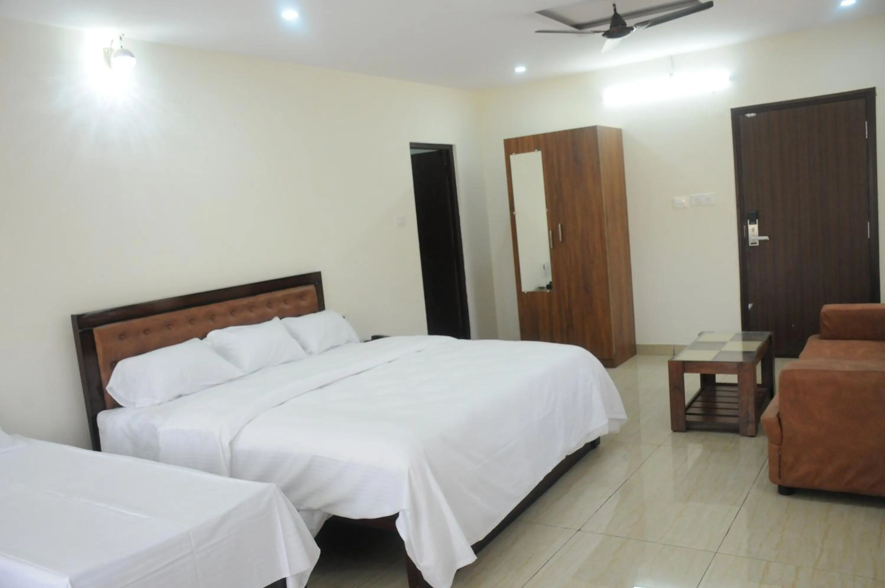 Bed in Amma Inn Elegance Suites and Apartments