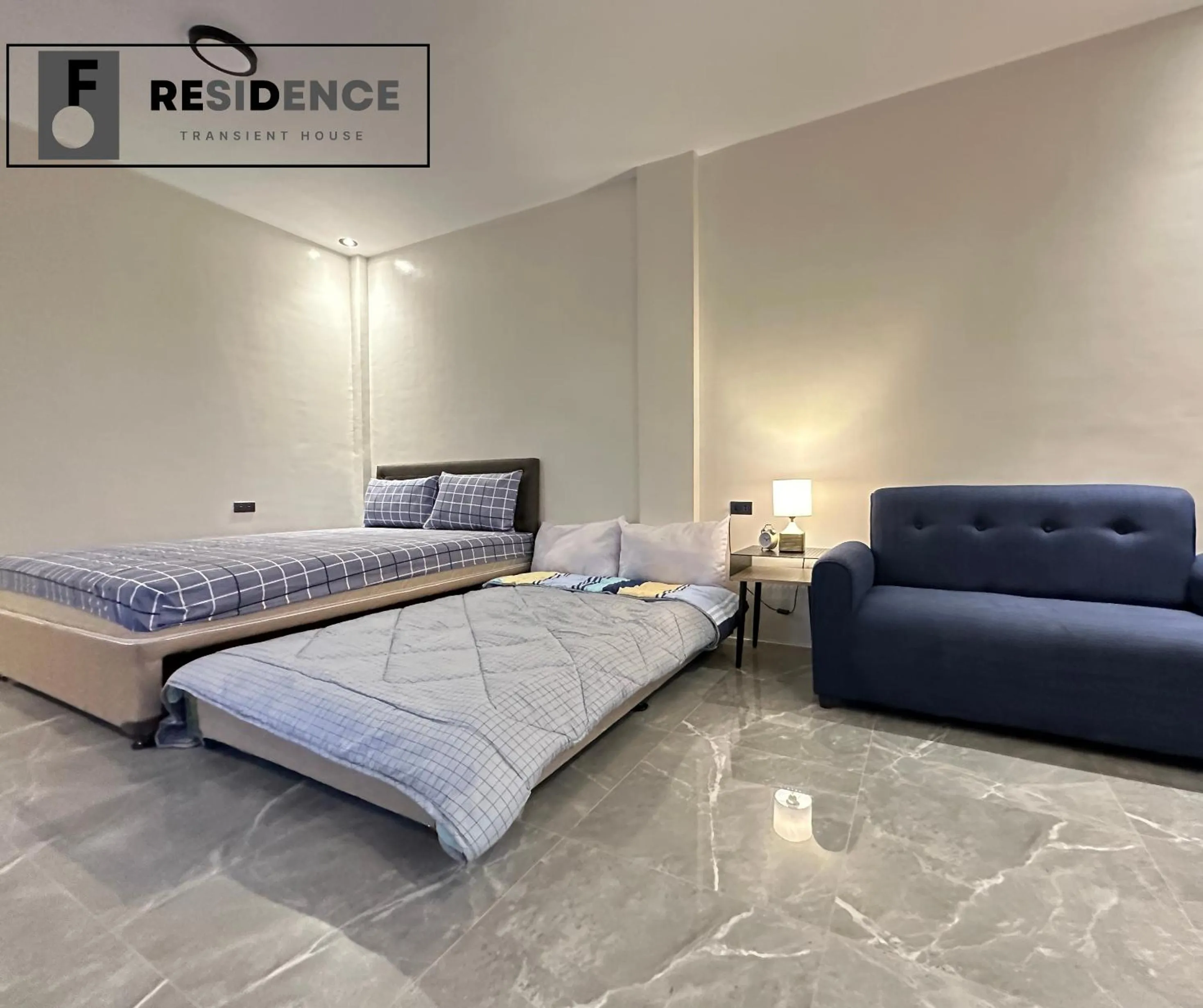 Bed in F Residence Transient House