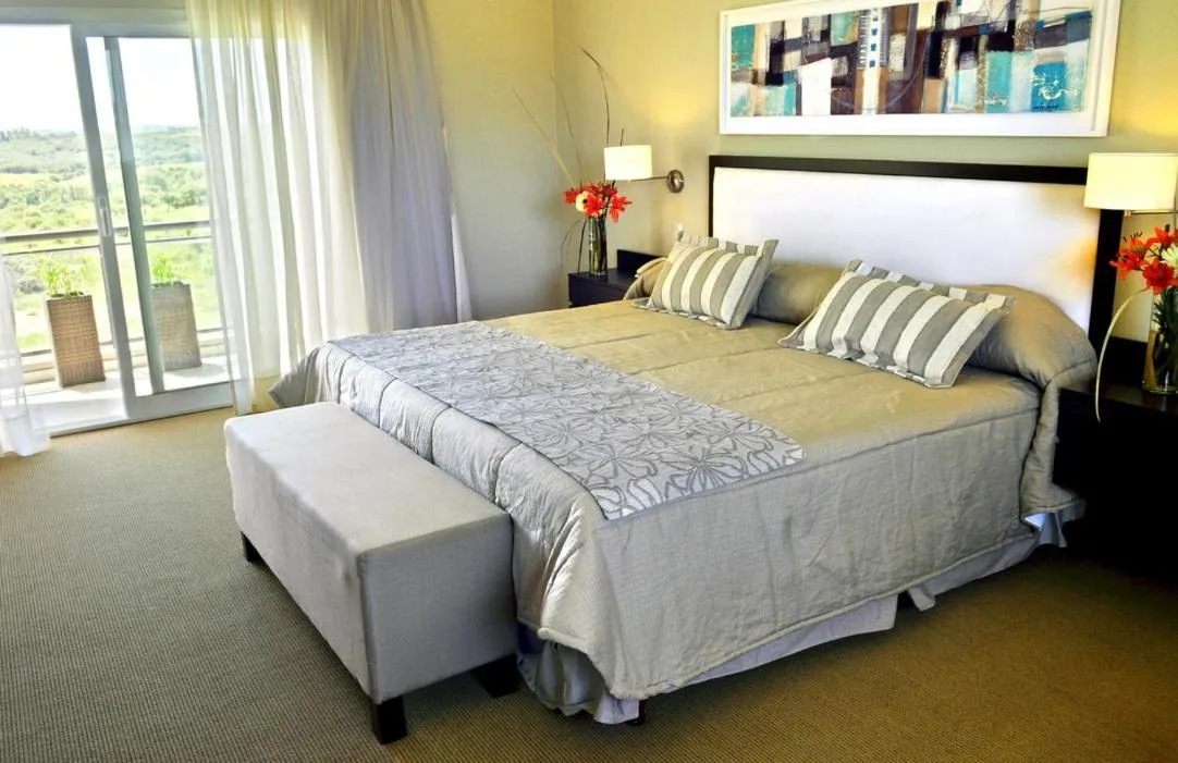 Bed in Howard Johnson Hotel Piedras Moras