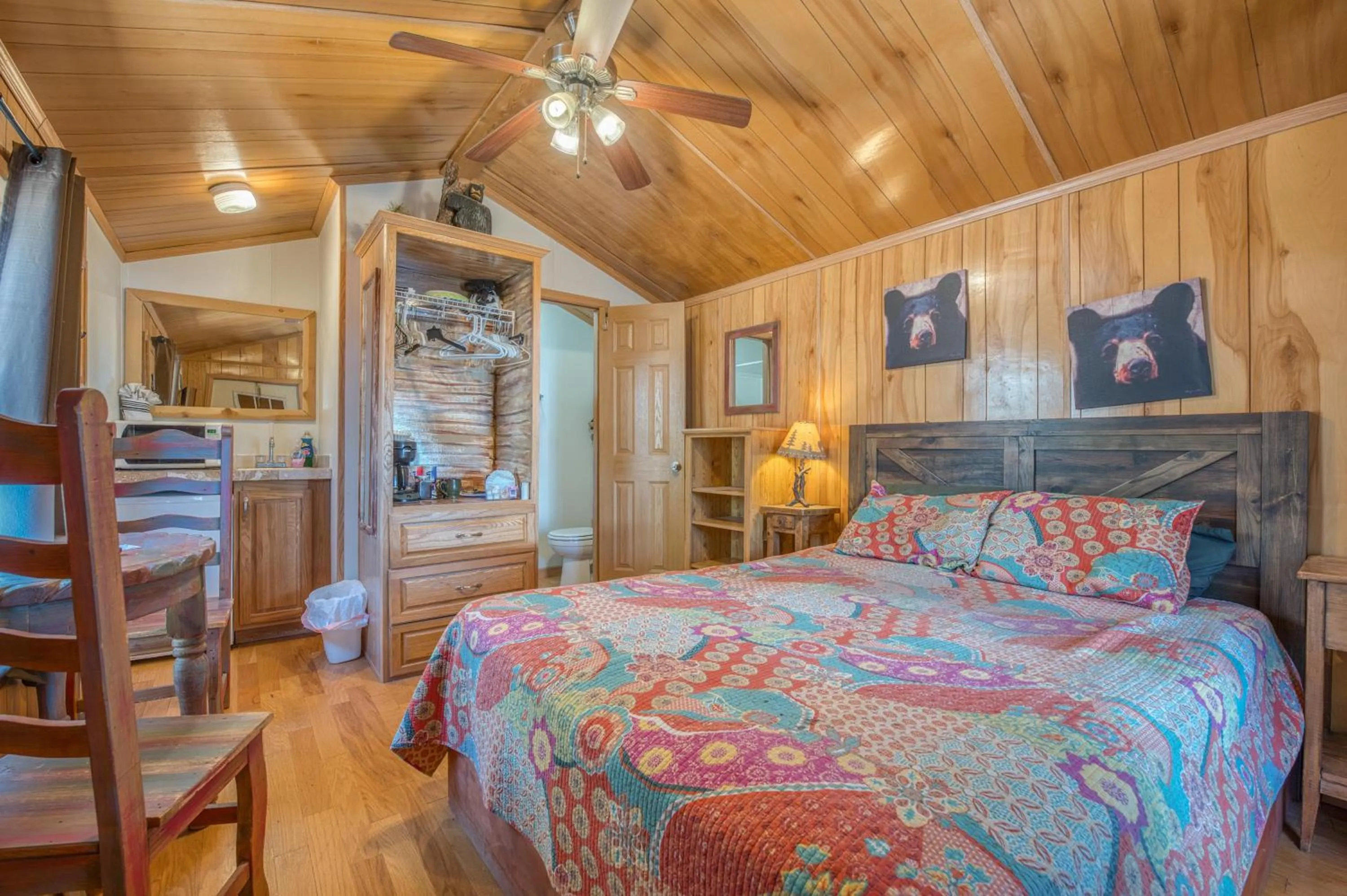 Bed in Enchanted Hideaway Cabins and Cottages