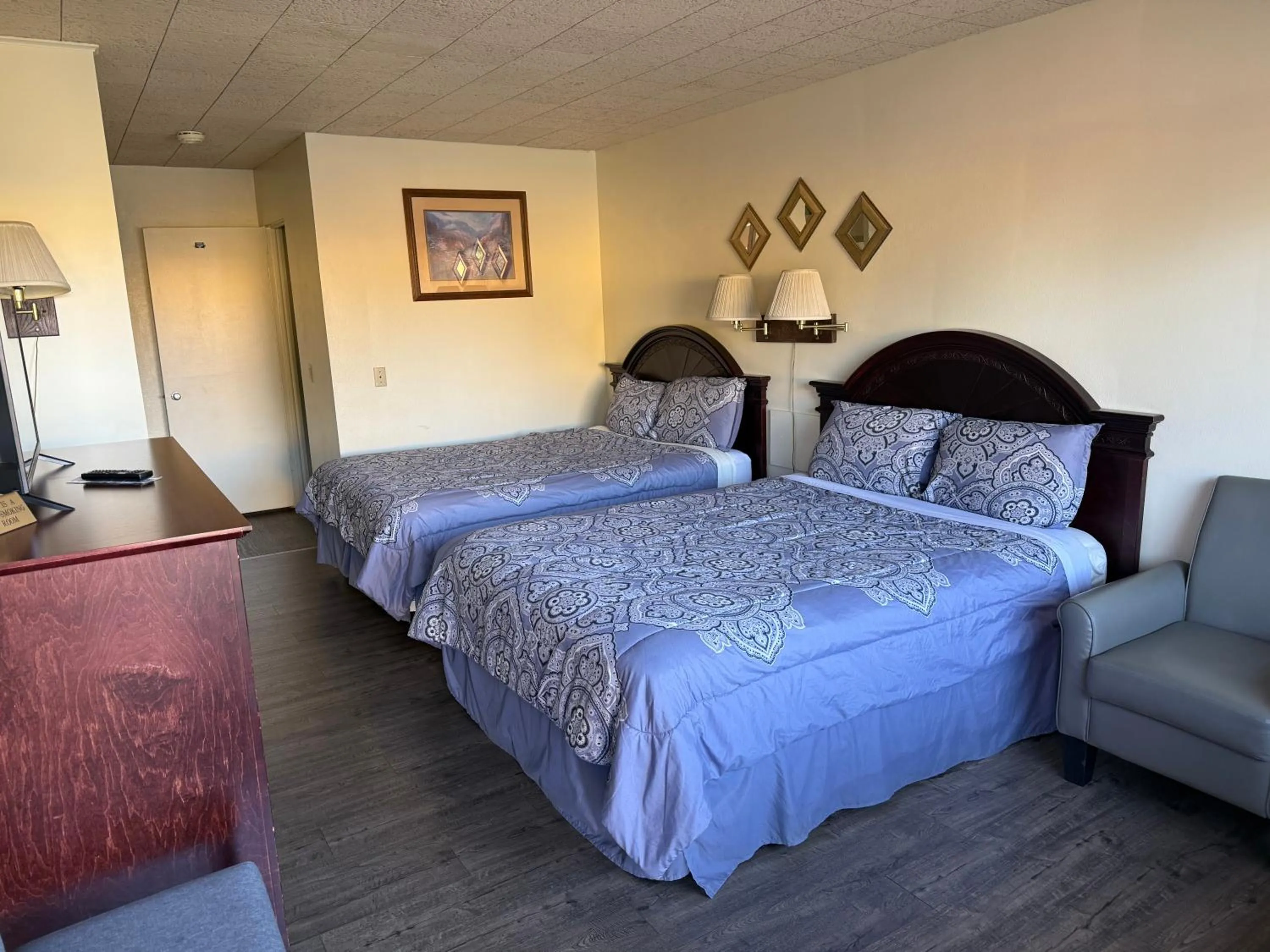 Bed in Downtowner Inn