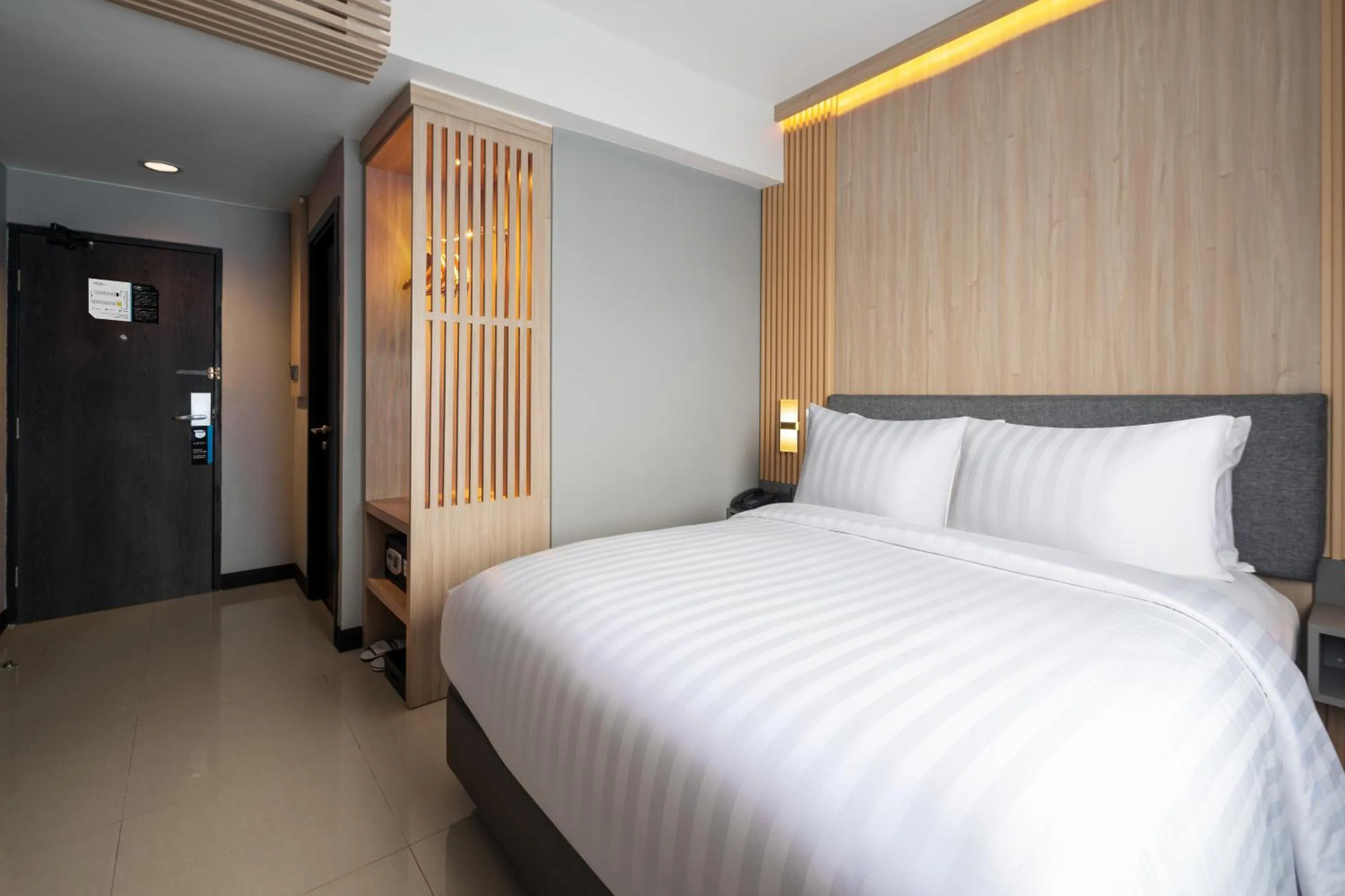 Bed in Aston Inn Rembang