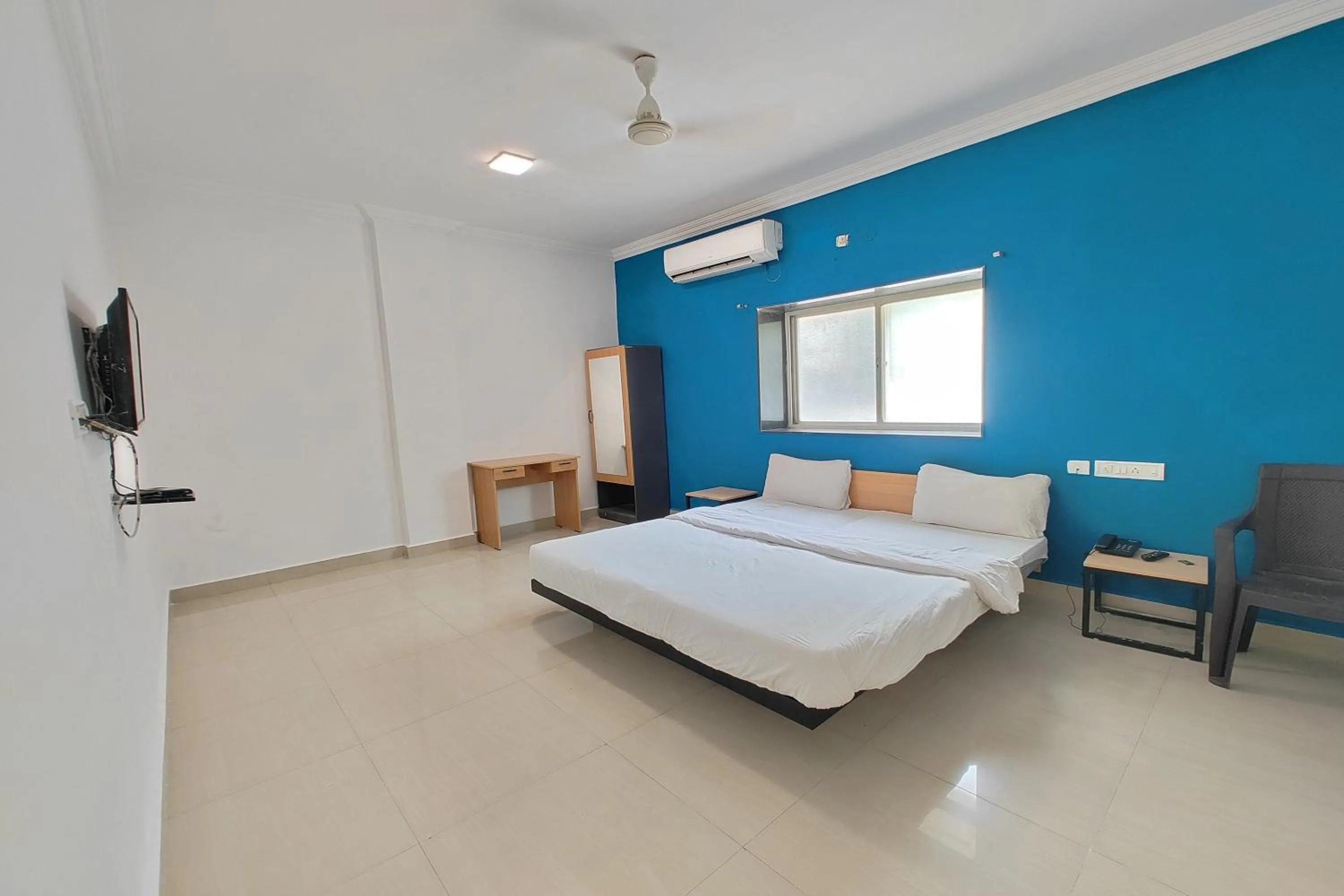 Bed in Hotel Sai Inn Executive