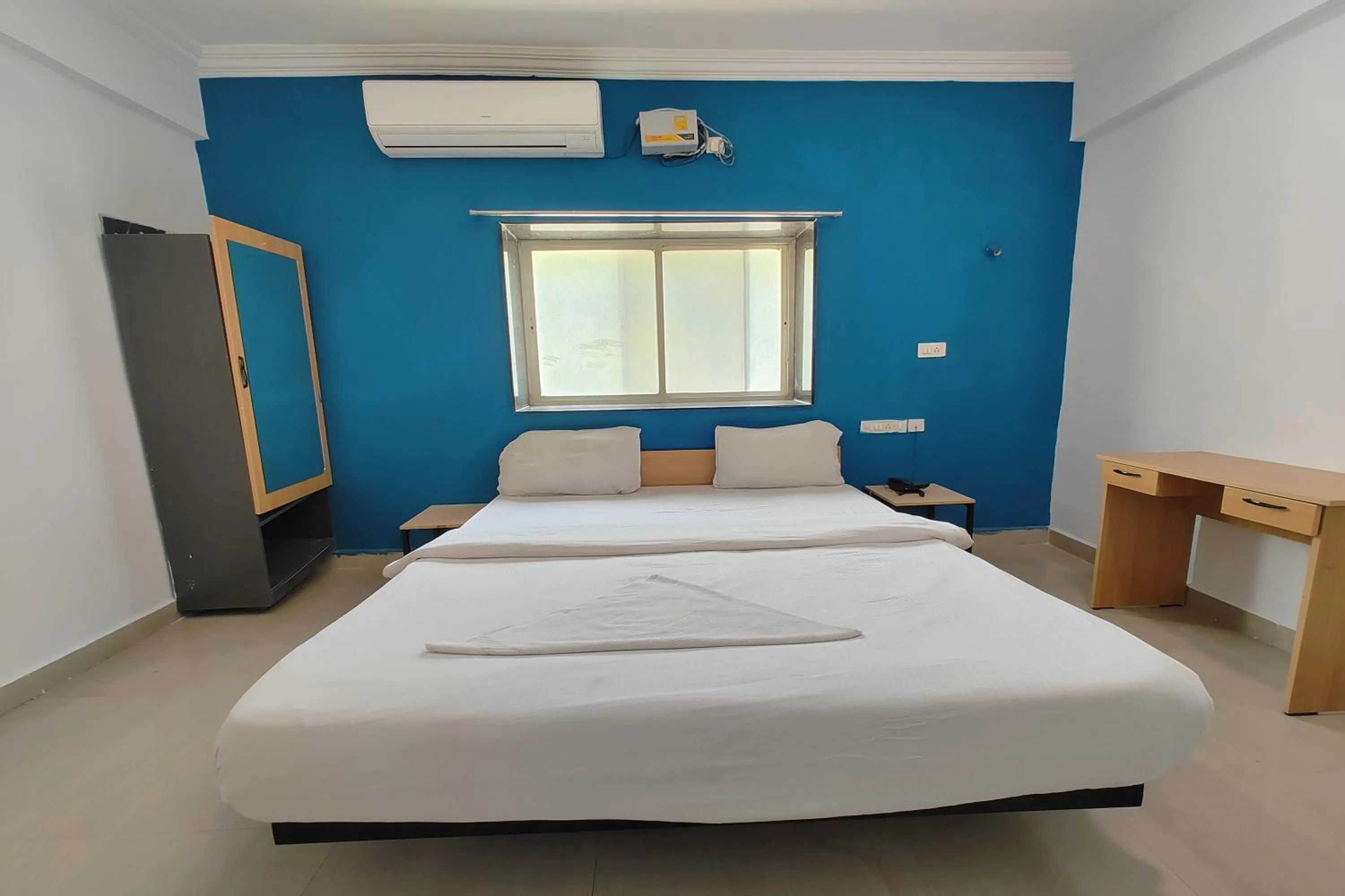 Bed in Hotel Sai Inn Executive