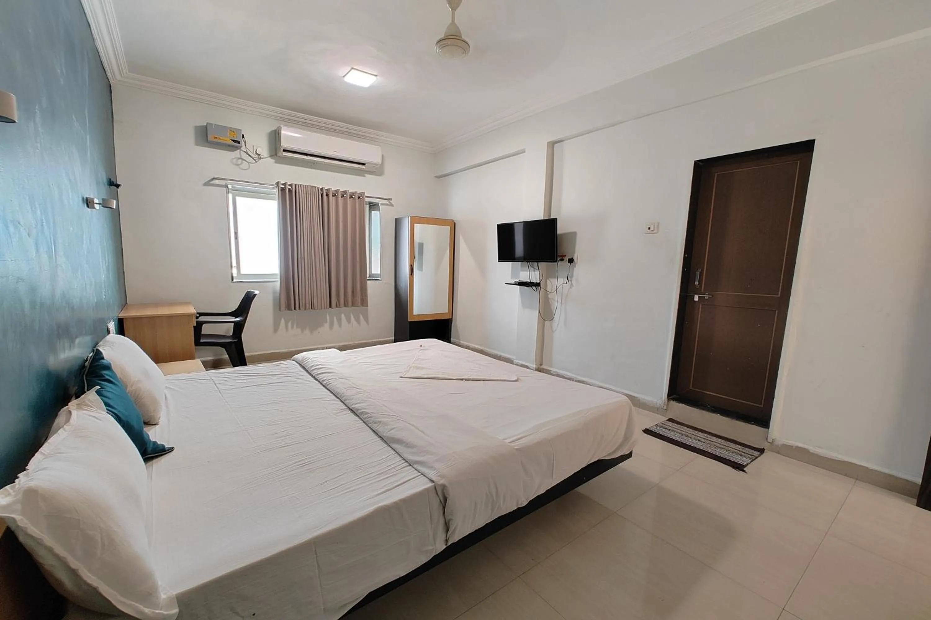 Bed in Hotel Sai Inn Executive