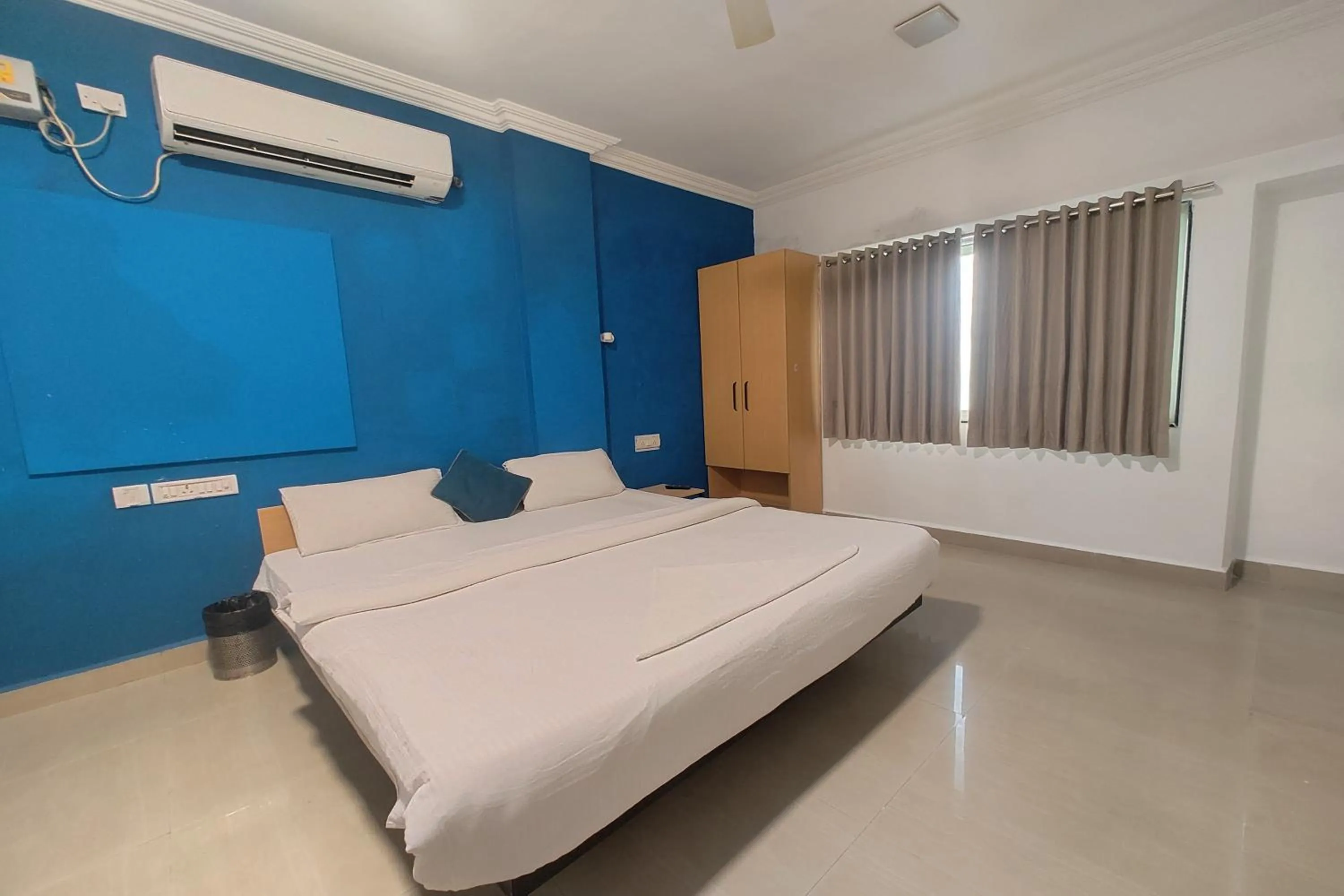 Bed in Hotel Sai Inn Executive