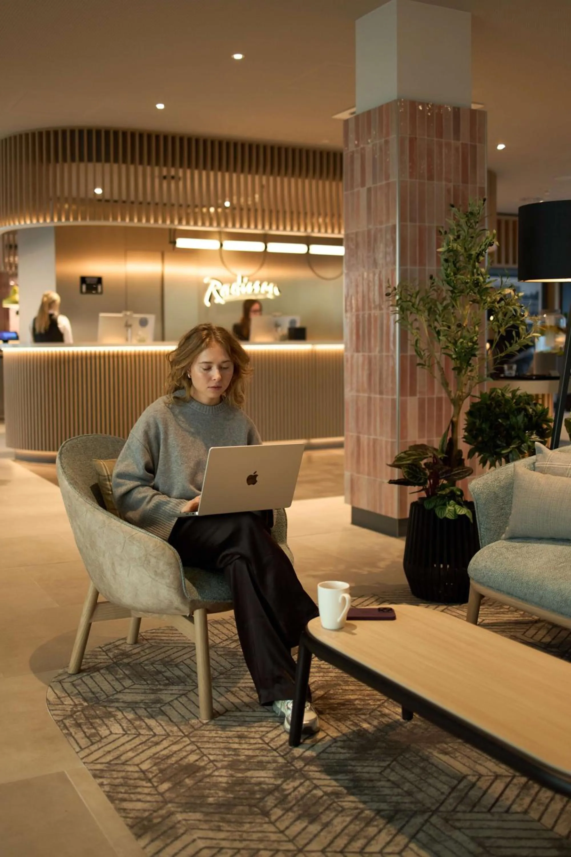 Lobby or reception in Radisson Hotel Leipzig