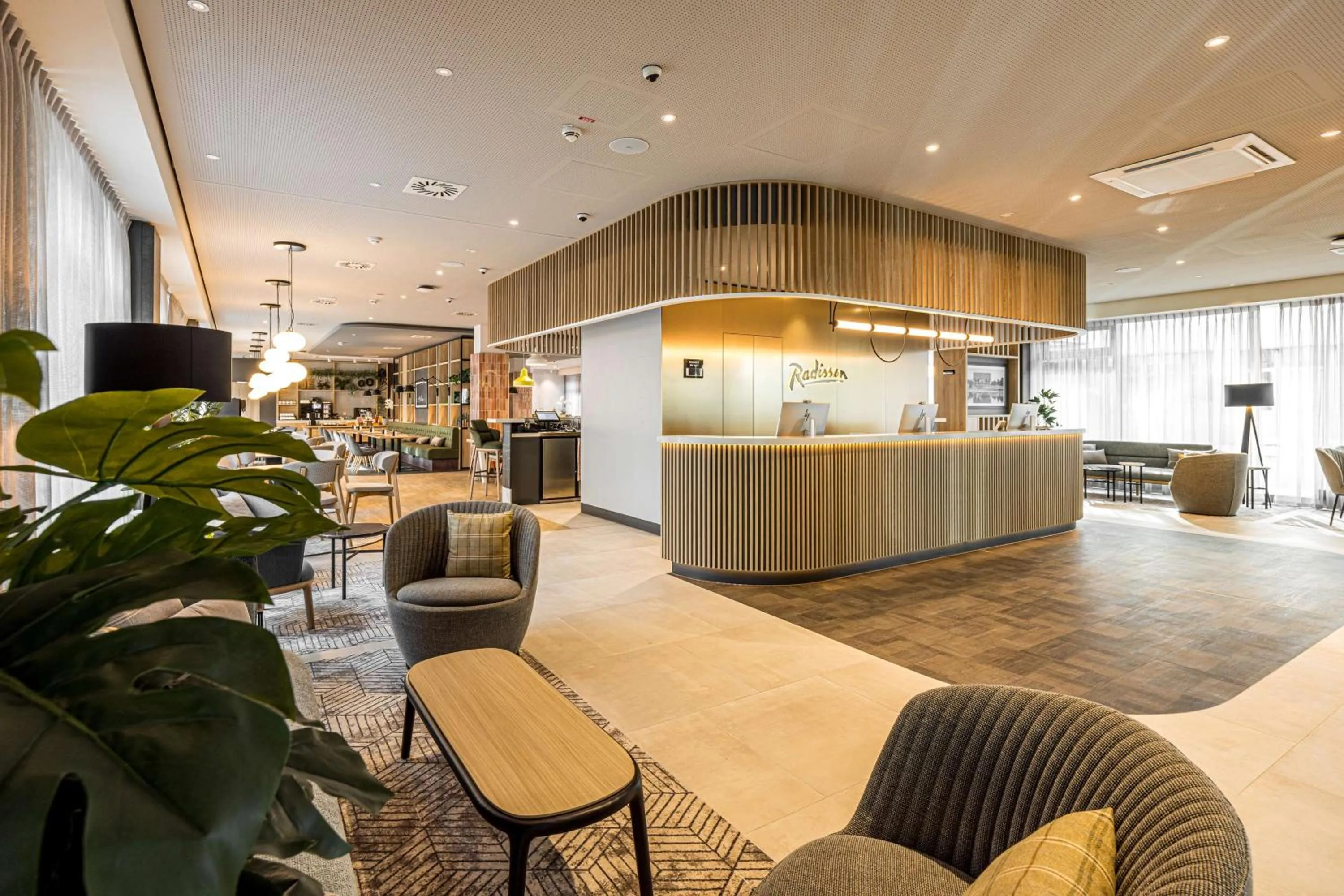 Lobby or reception in Radisson Hotel Leipzig