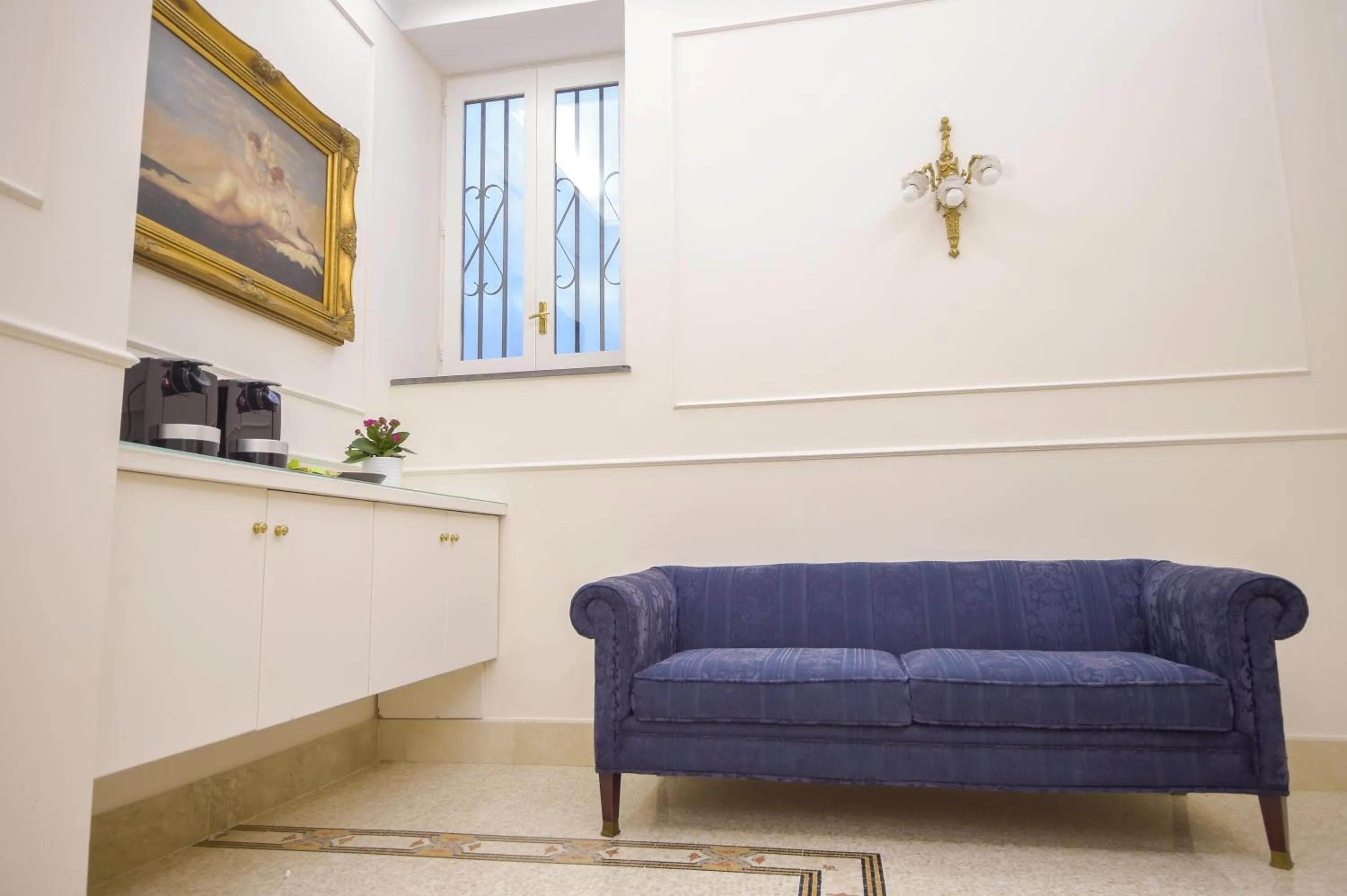 Communal lounge/ TV room in Palazzo Liguori