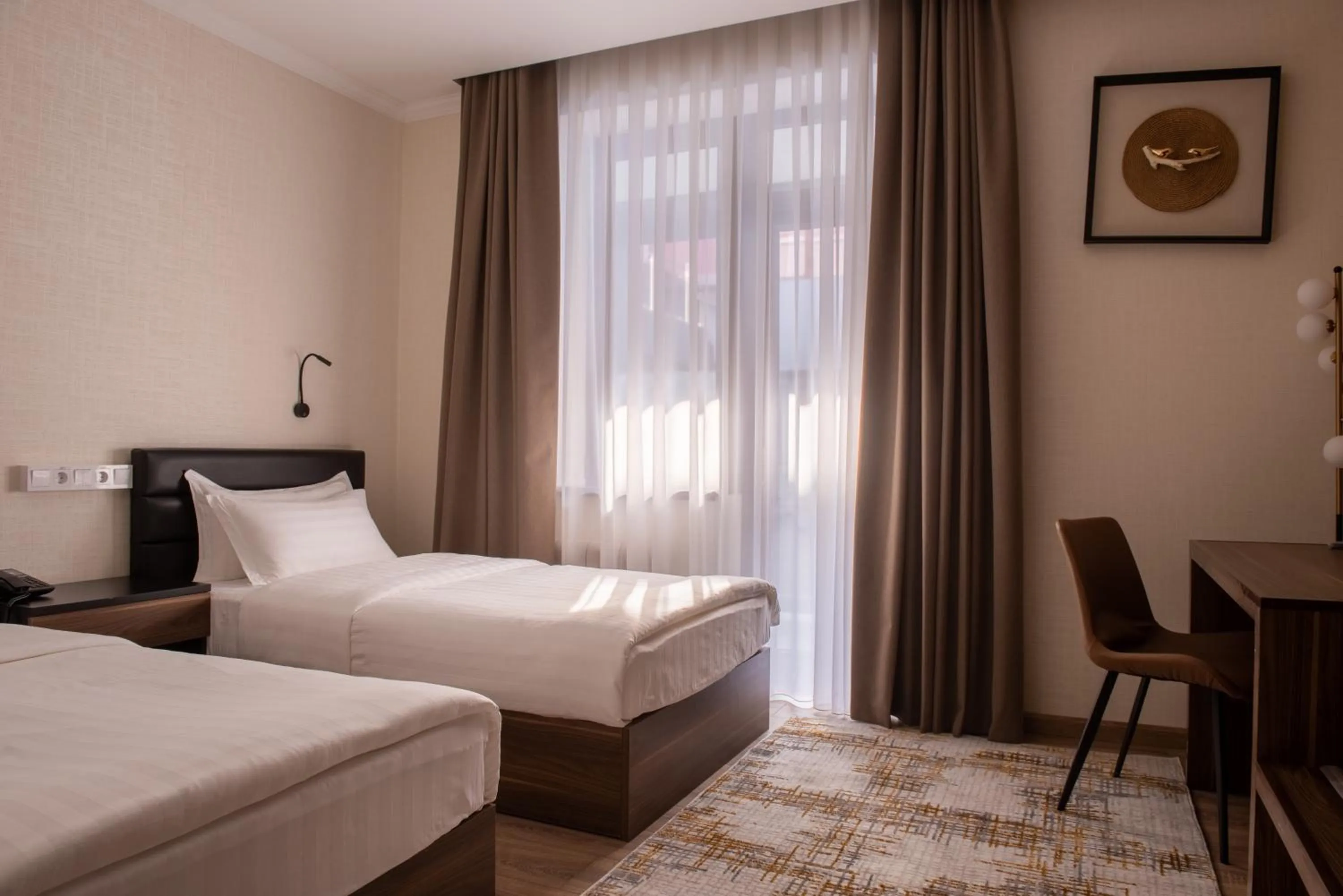 Bed in Silk Road Premium Hotel