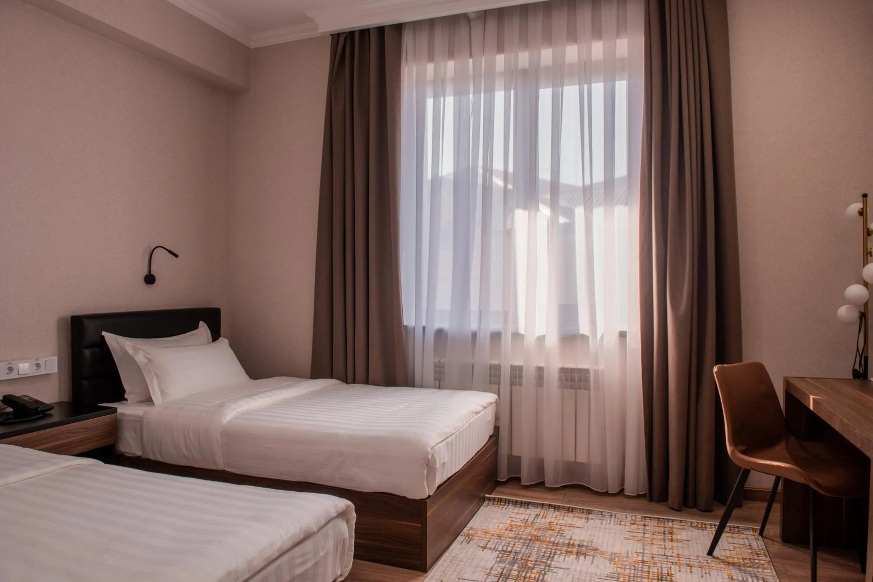 Bed in Silk Road Premium Hotel