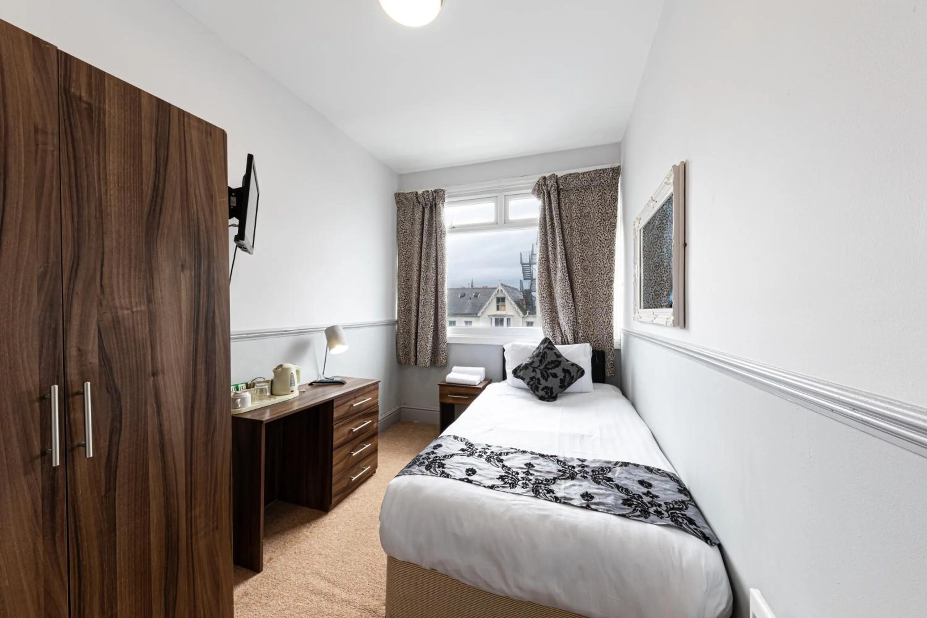 Bed in The Manor Hotel