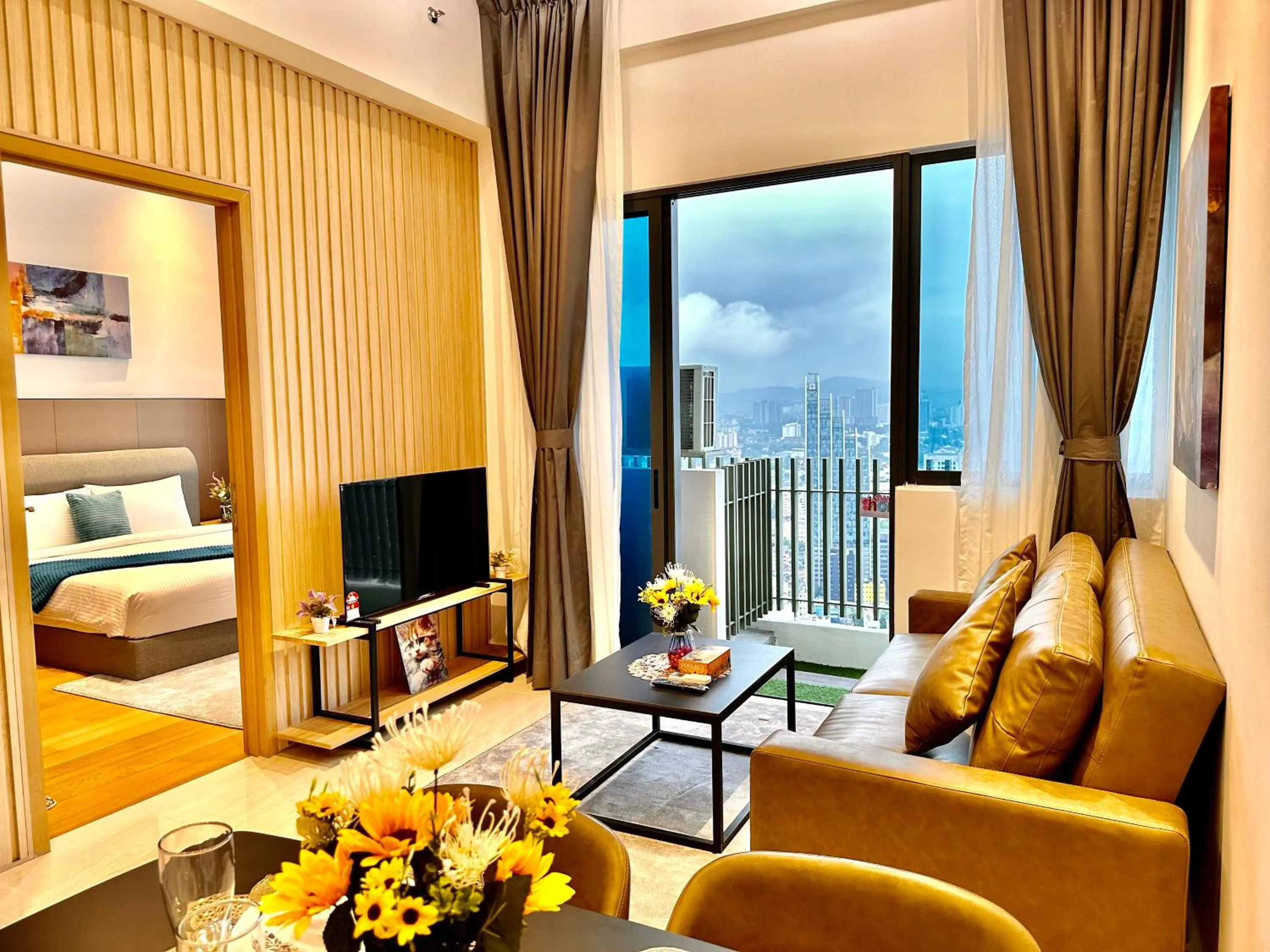 Communal lounge/ TV room, Bed in The Luxe Colony KLCC By AZHA