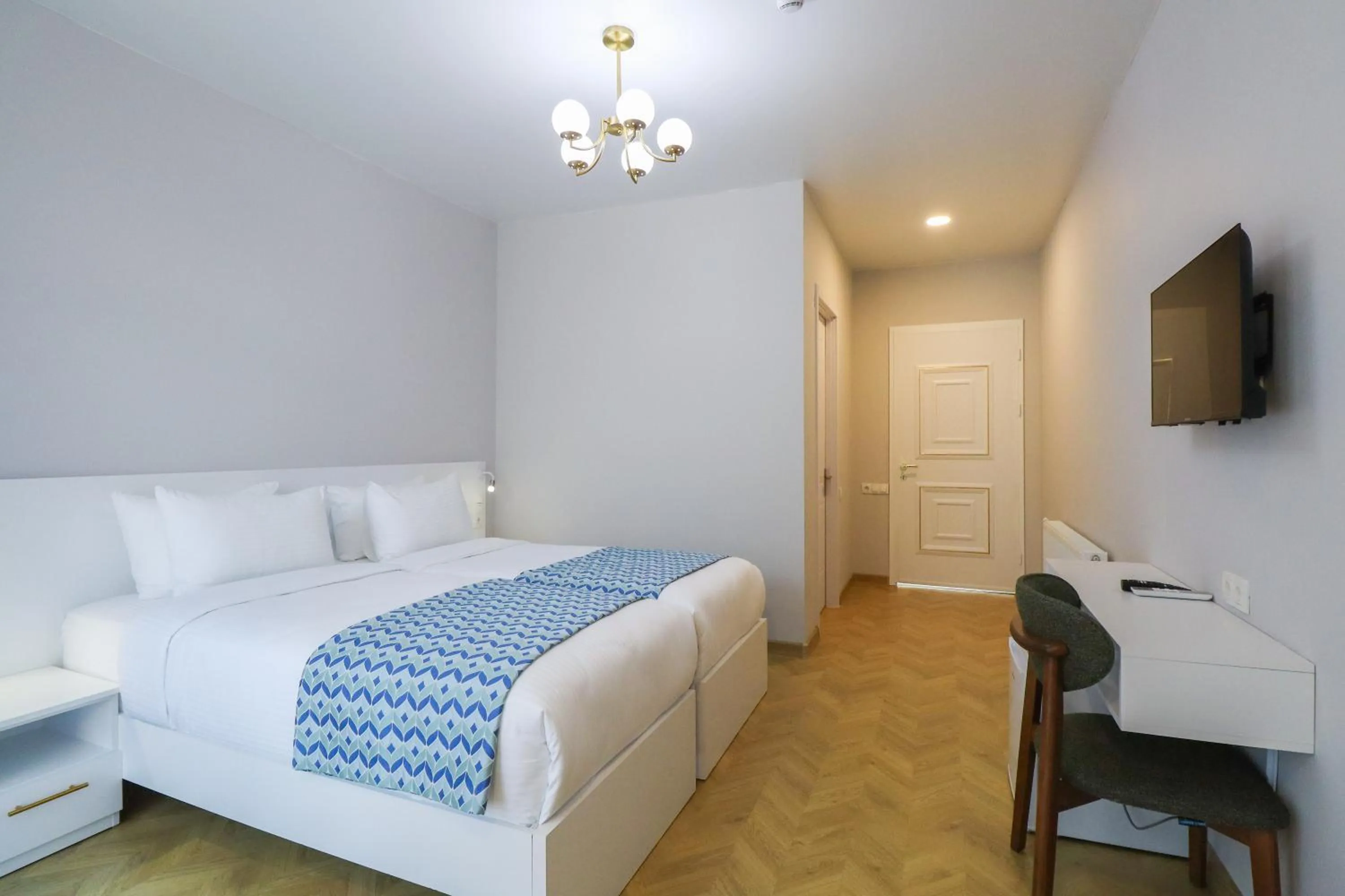 Bed in Emerald Borjomi Hotel