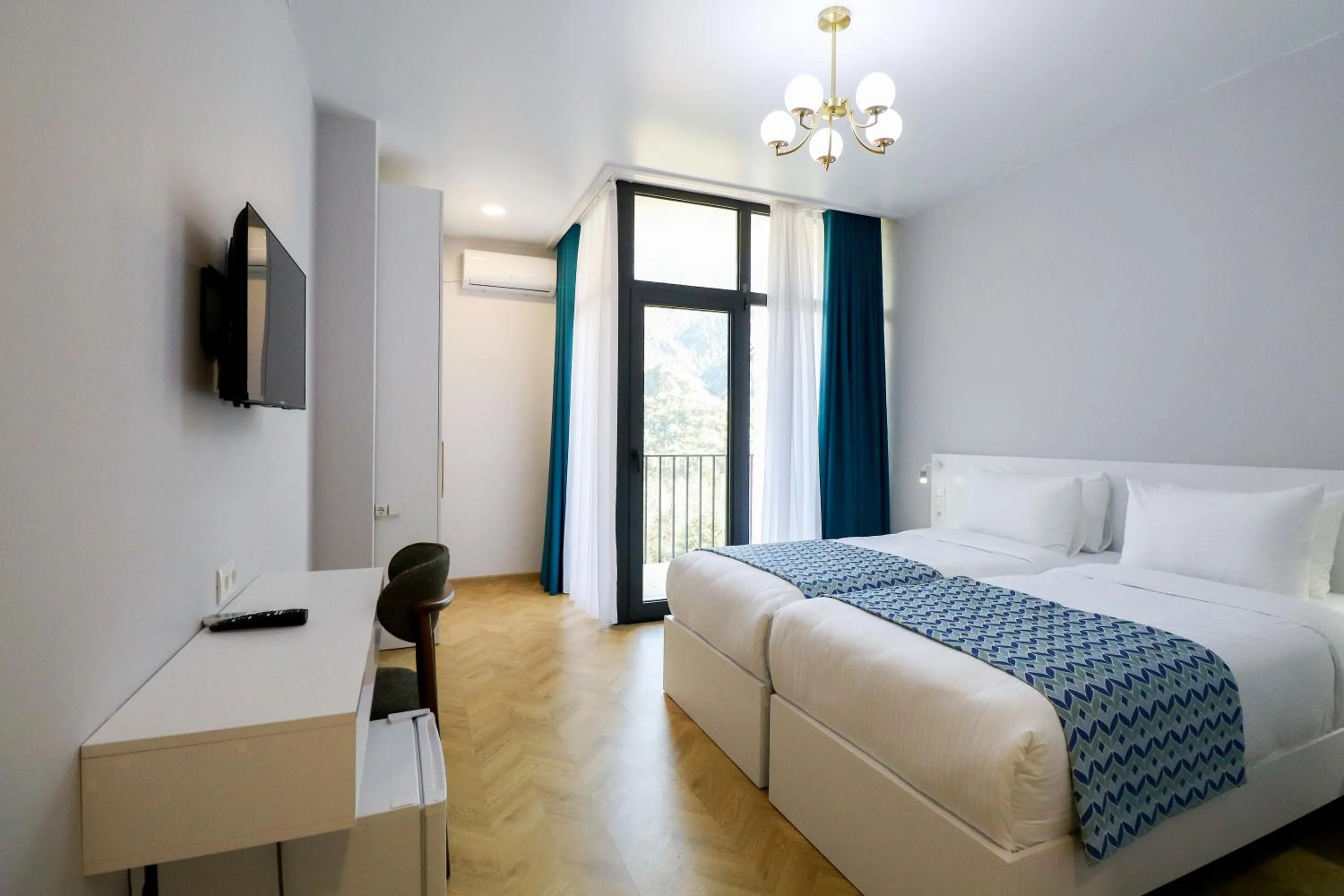 Bed in Emerald Borjomi Hotel