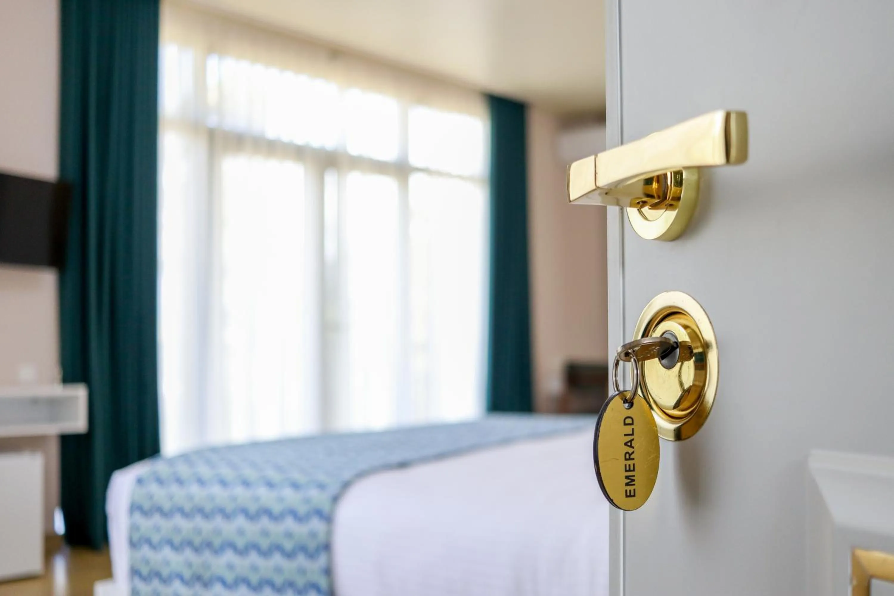 Bed in Emerald Borjomi Hotel