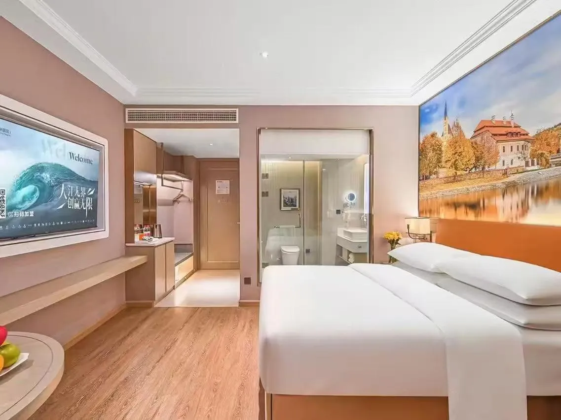 Bed in Vienna Hotel Jiangjin Wanda Plaza Shengquansi Subway Station