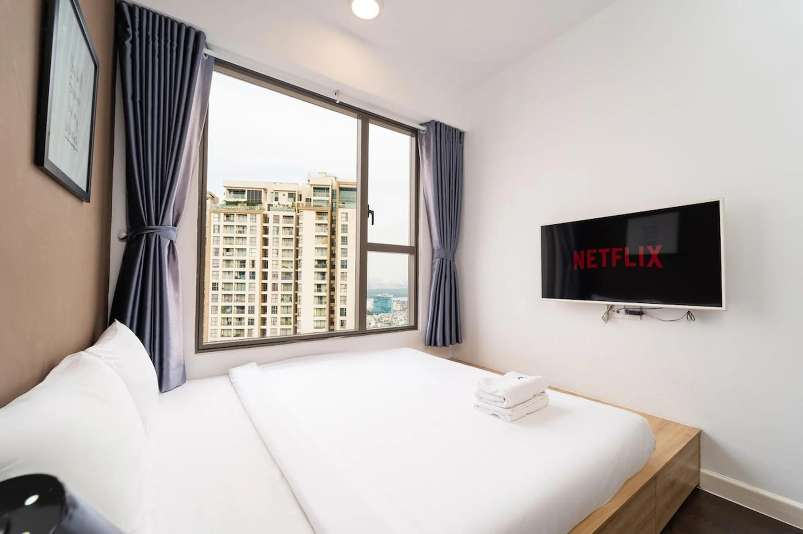 Bed in The RiverGate Apartments & Condo Saigon