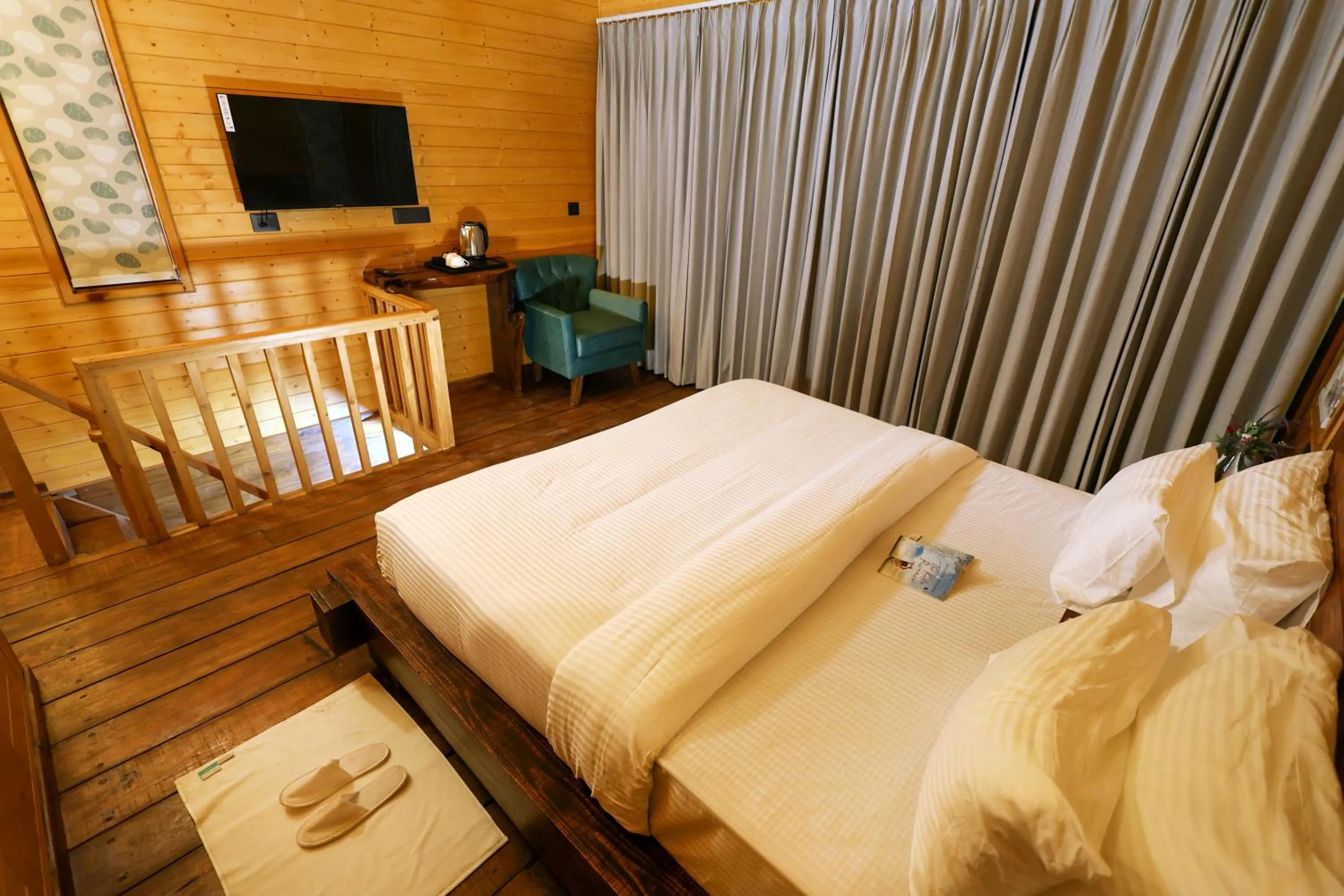 Bed in Koro Treehouse Resort Luxury Wooden Cottages and Villas with Private Pool