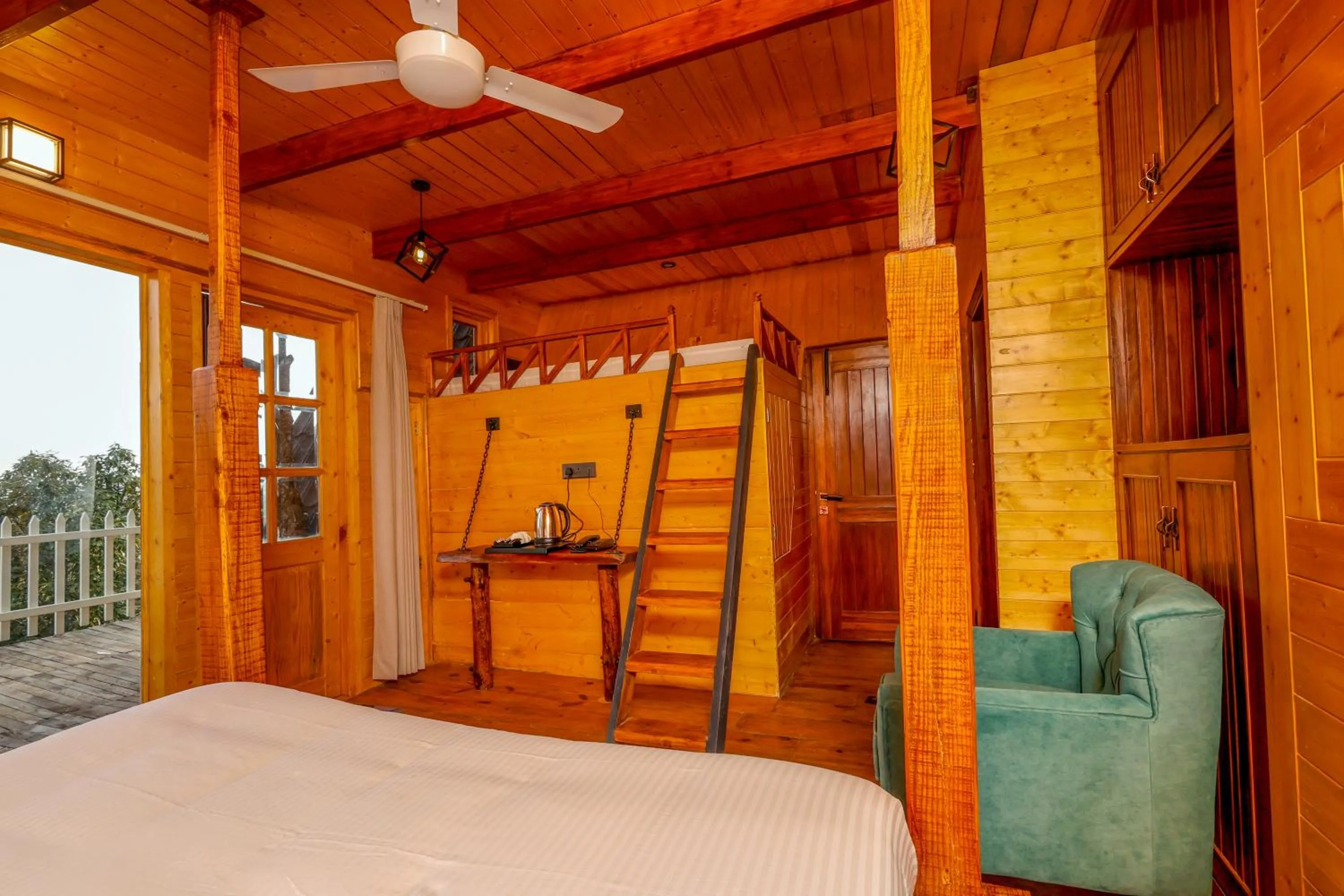 Bed in Koro Treehouse Resort Luxury Wooden Cottages and Villas with Private Pool