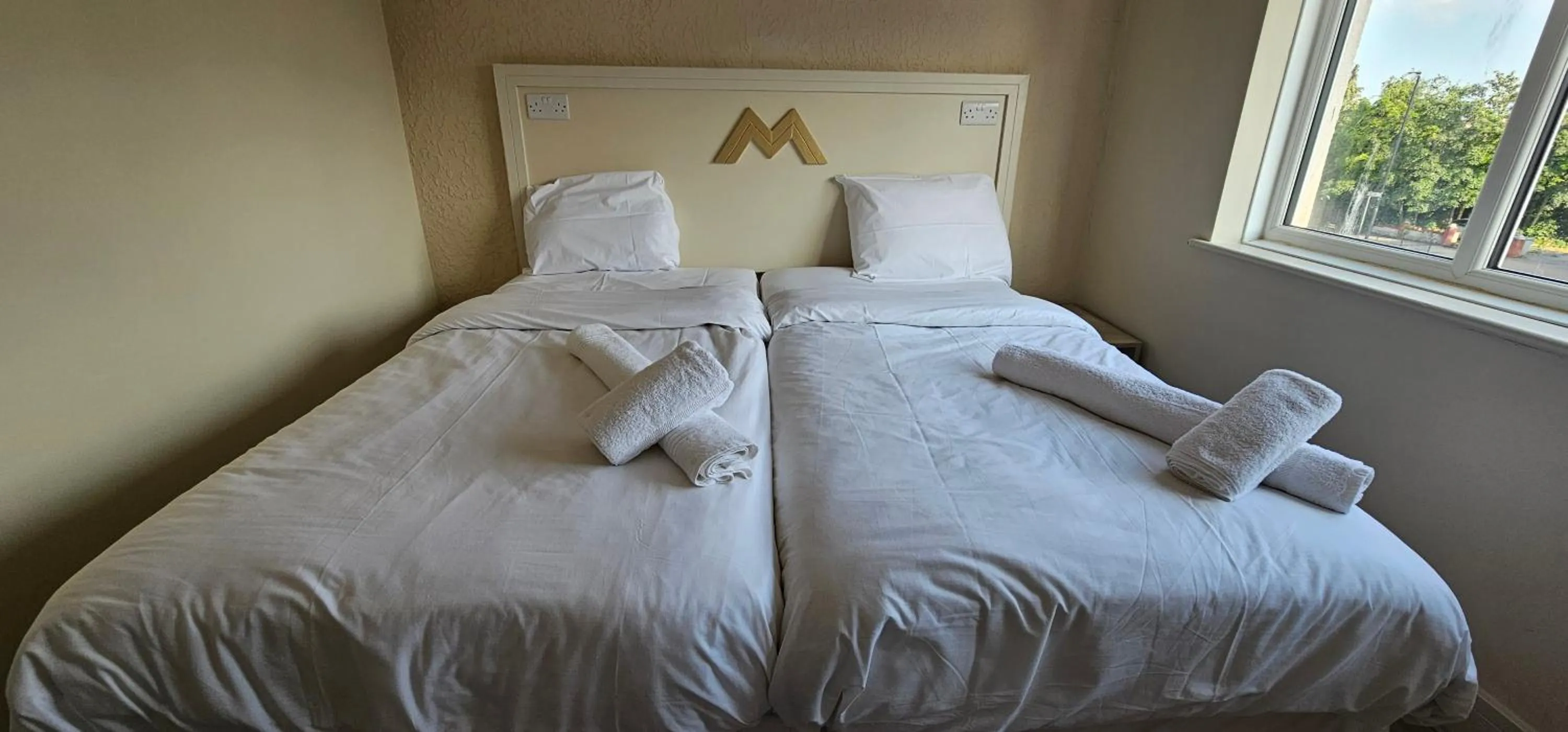 Bed in MSM Arena Hotel