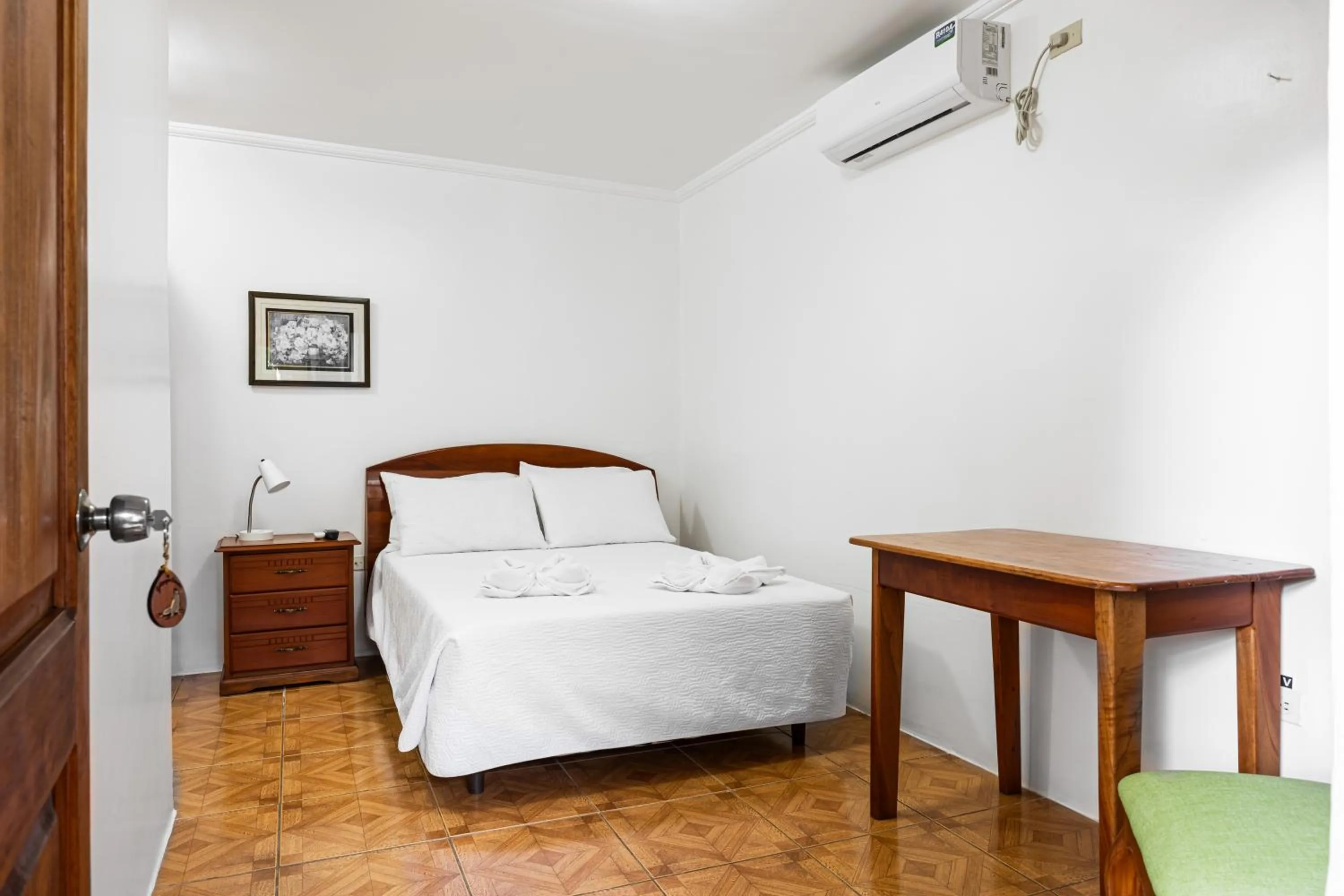 Bed in La Peregrina Galapagos B&B