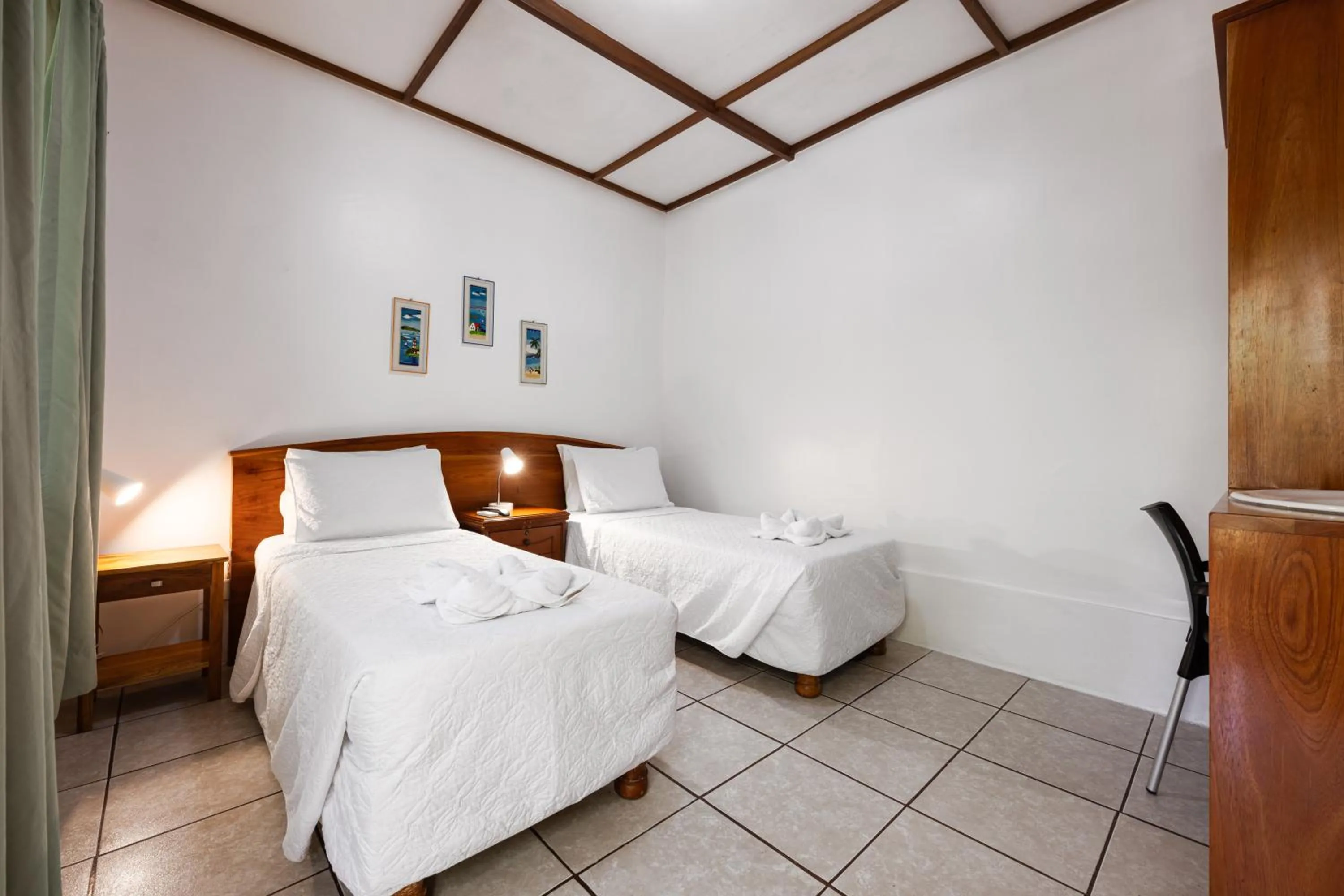 Bed in La Peregrina Galapagos B&B