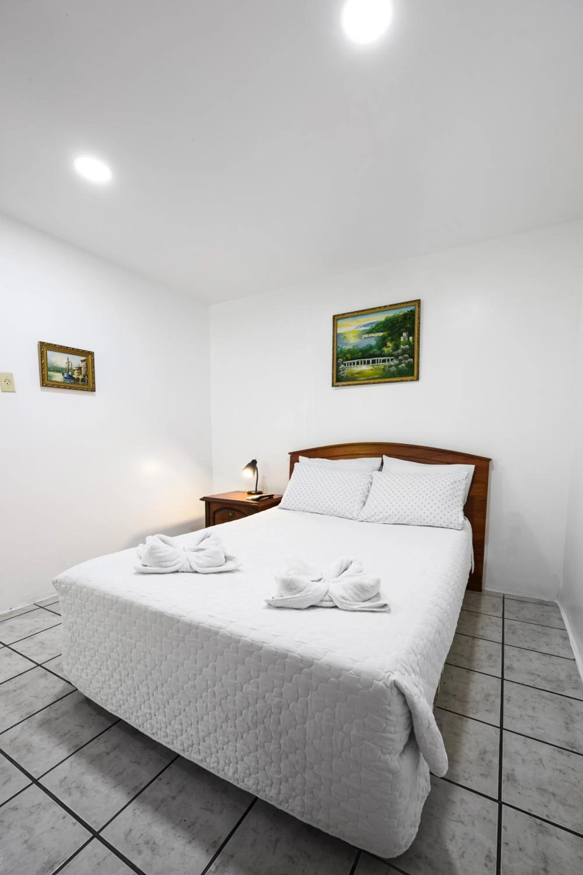 Bed in La Peregrina Galapagos B&B